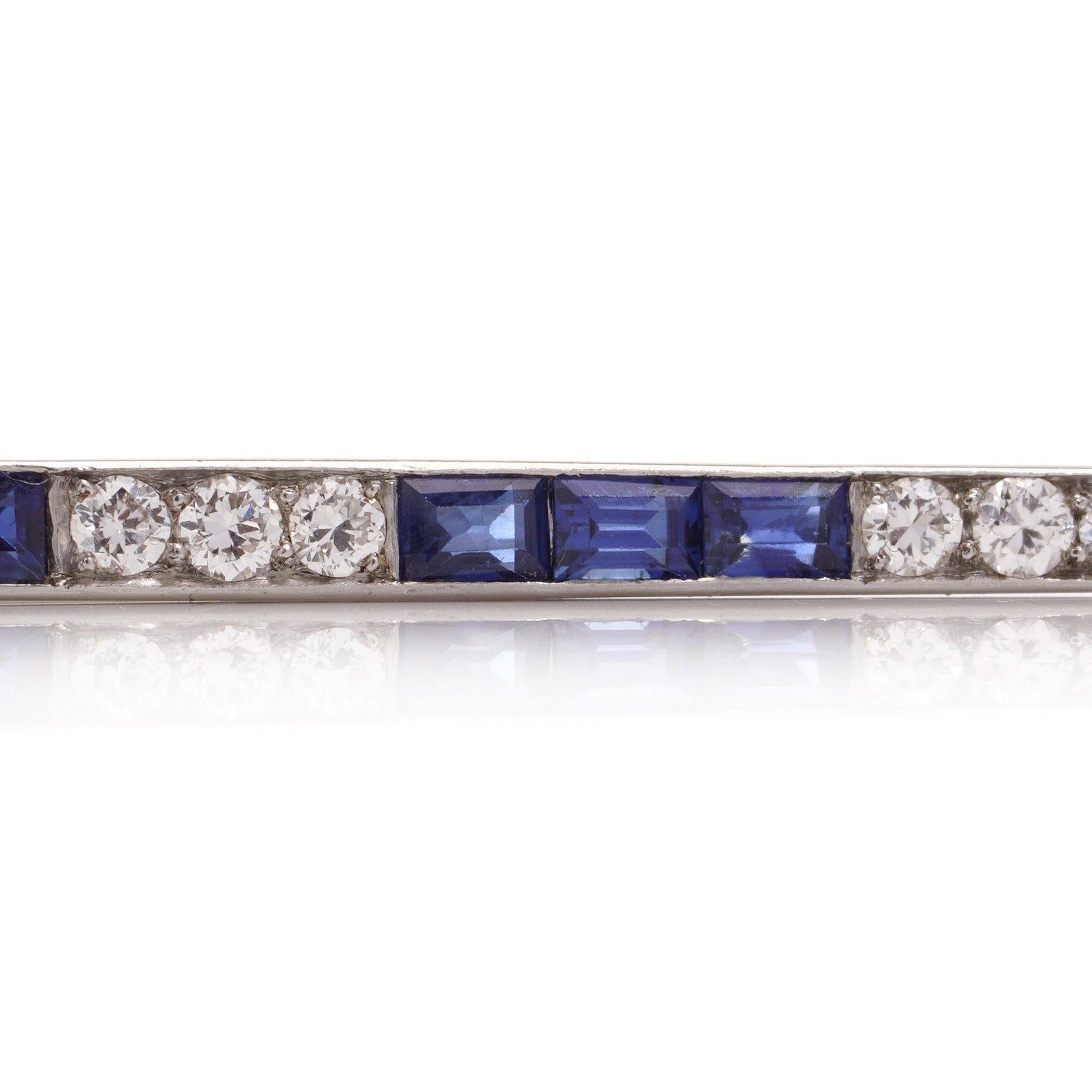Women's Platinum bar brooch set with sapphires and diamonds  For Sale