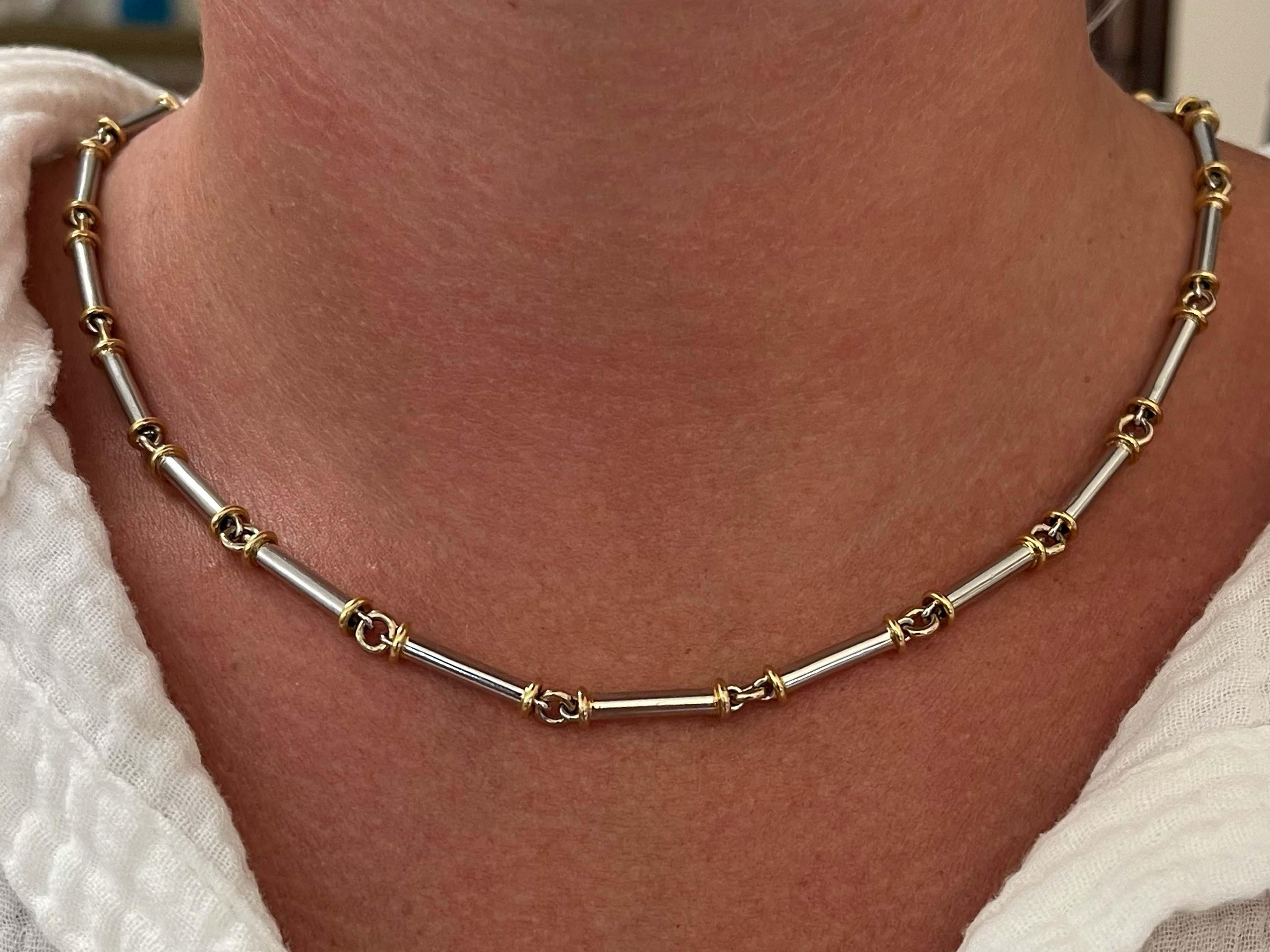Item Specifications:

Style: Sectional Necklace

Metal: Platinum and 18k Yellow Gold

Total Weight: 31.3 Grams

Chain Length: 18 inch

Closure: Lobster Clasp
​
​Stamped: 