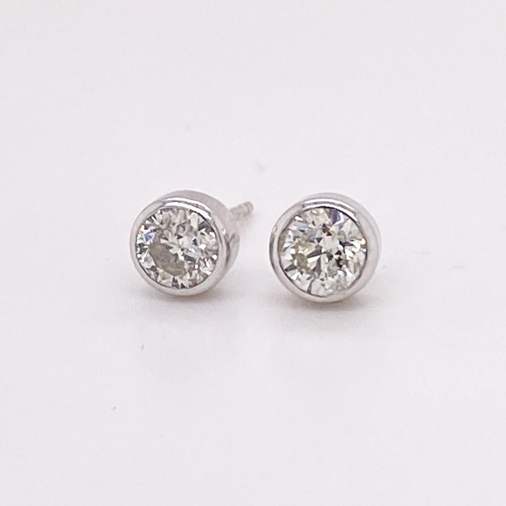 Platinum Bezel Diamond Solitaire Studs .70 Carats, 18K White Gold Posts & Backs In New Condition For Sale In Austin, TX
