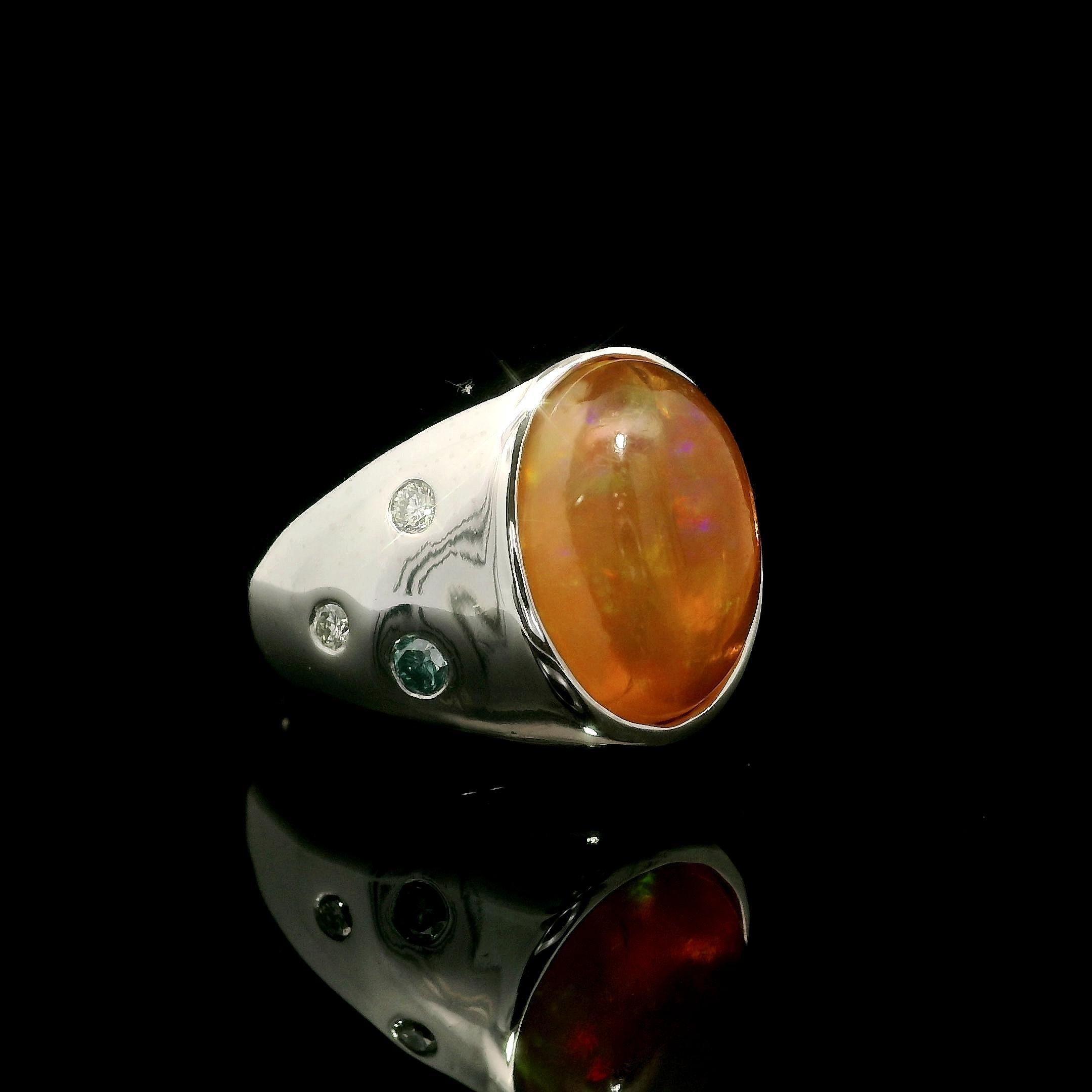 --Stone(s):--
(1) Natural Genuine Jelly Opal - Oval Cabochon Cut - Bezel Set - Orange Color w/ Great Play of Color - 4.35ct (exact)
(7) Natural Genuine Diamonds - Round Cut - Burnish Set - Nice Brilliant 4 White & 3 Blue (Origin of color not tested)