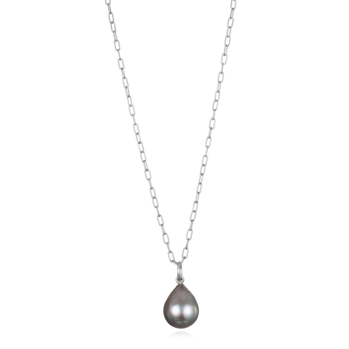 This beautiful Faye Kim Platinum Black Tahitian Pearl Drop Pendant, with its classic matte platinum jump ring, is both lustrous and classic. The pendant's modern design conveys understated elegance and a truly stylish, everyday look and is perfect