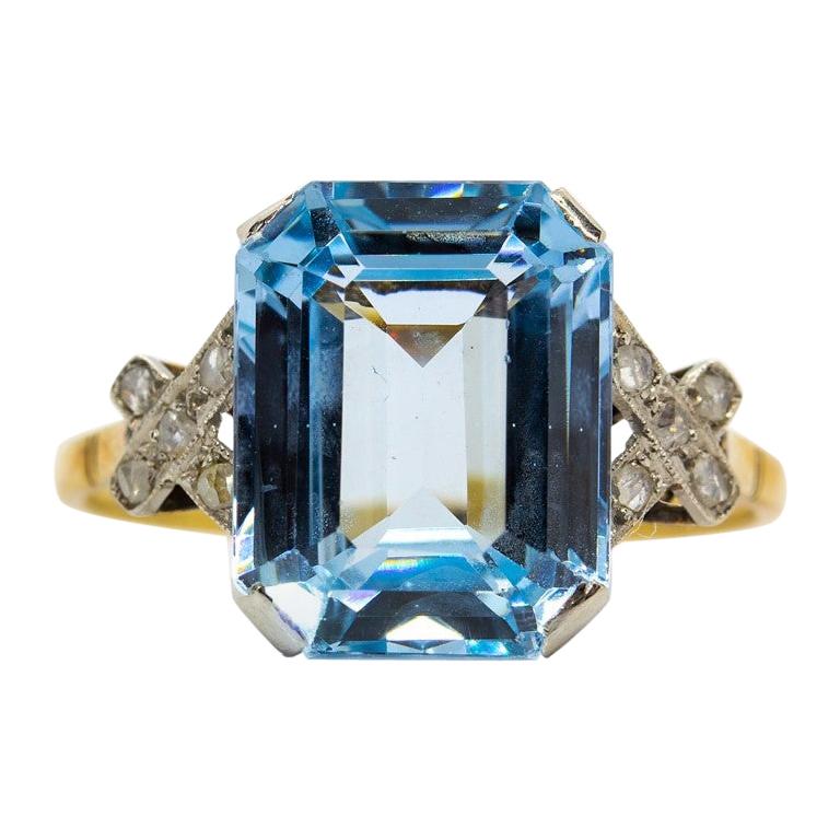 Platinum Blue Topaz and Diamonds Ring