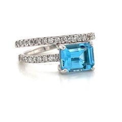 Platinum Blue Topaz Diamond Crossover Ring 1.31 Carats