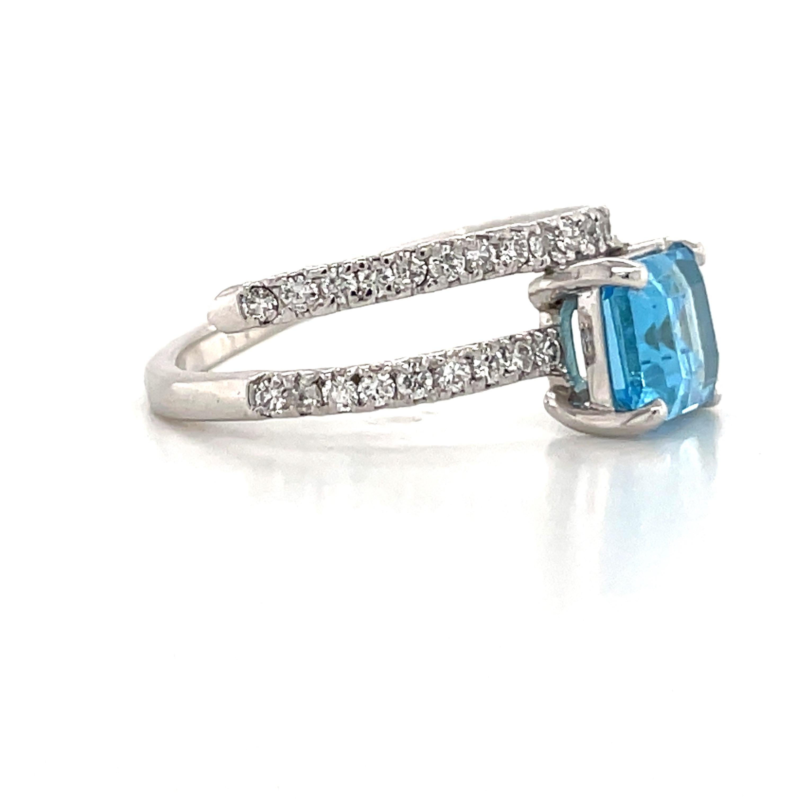 Platinum Blue Topaz Diamond Crossover Ring 1.31 Carats In New Condition In New York, NY