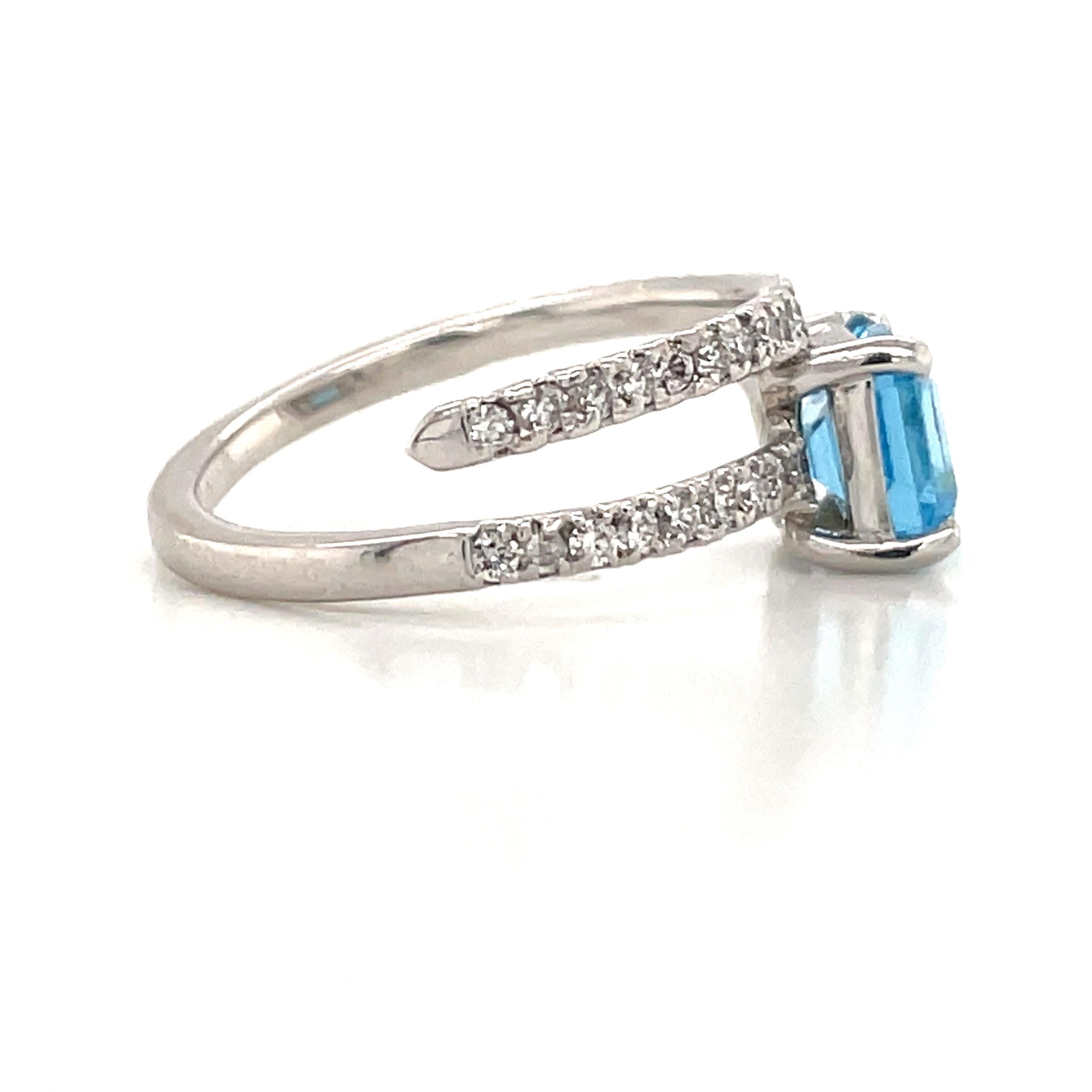 Women's Platinum Blue Topaz Diamond Crossover Ring 1.31 Carats