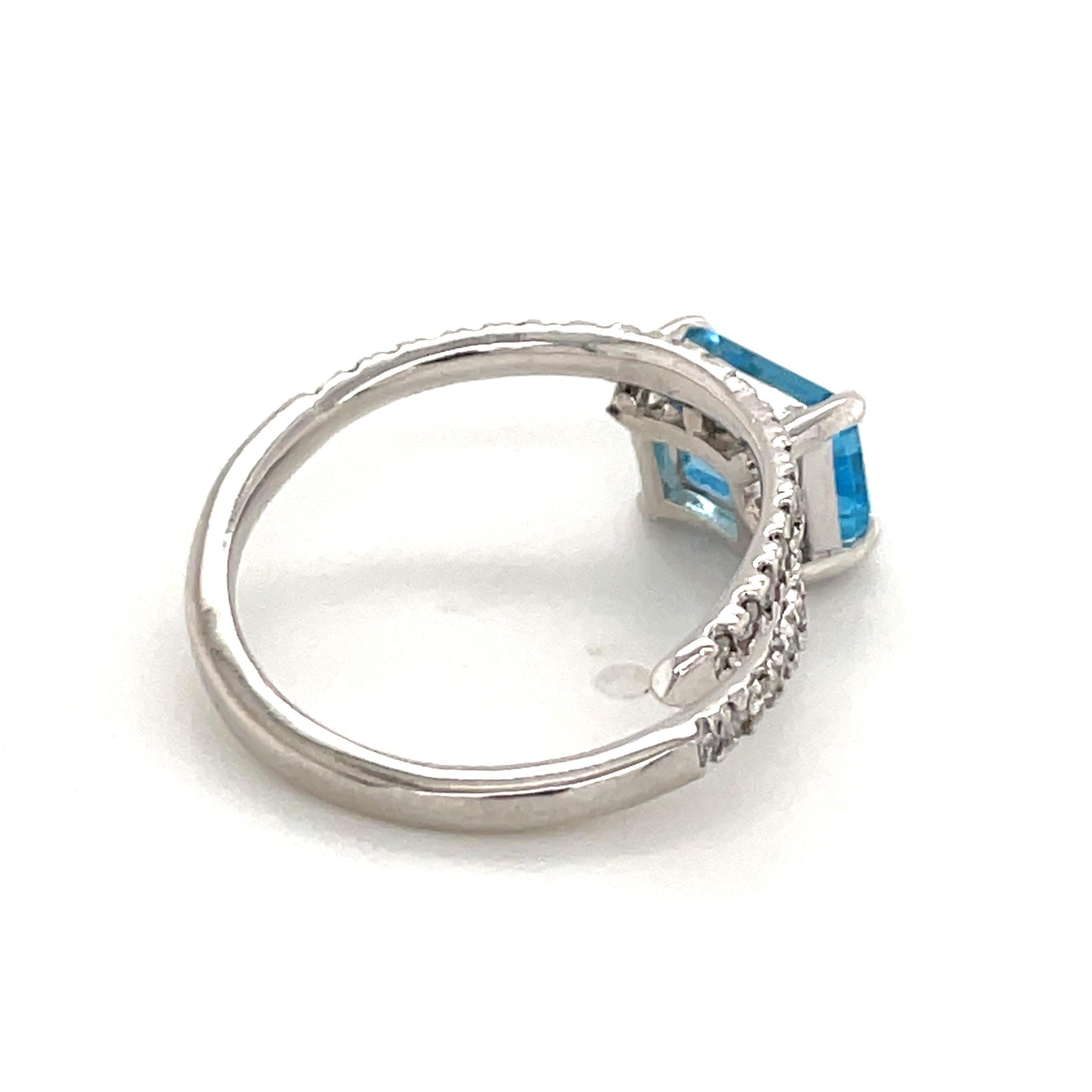 Platinum Blue Topaz Diamond Crossover Ring 1.31 Carats 1