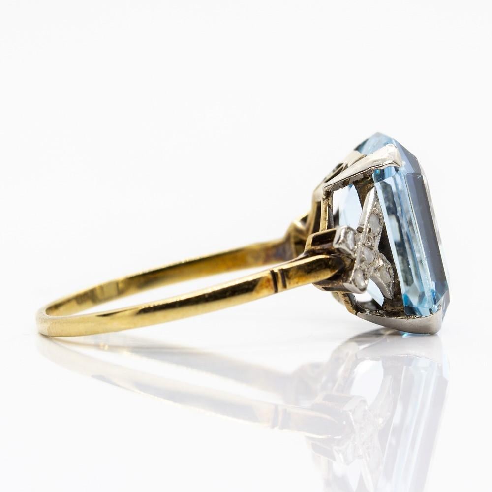 Composition: Platinum
•	1 blue topaz 7ctw.
•	10 rose cut diamonds J-SI1 0.10ctw.
Ring size: 8 ¼ 
Ring face measurement: 13mm by 10mm
Height: 7mm
Total weight: 3.3 grams – 2.1dwt
