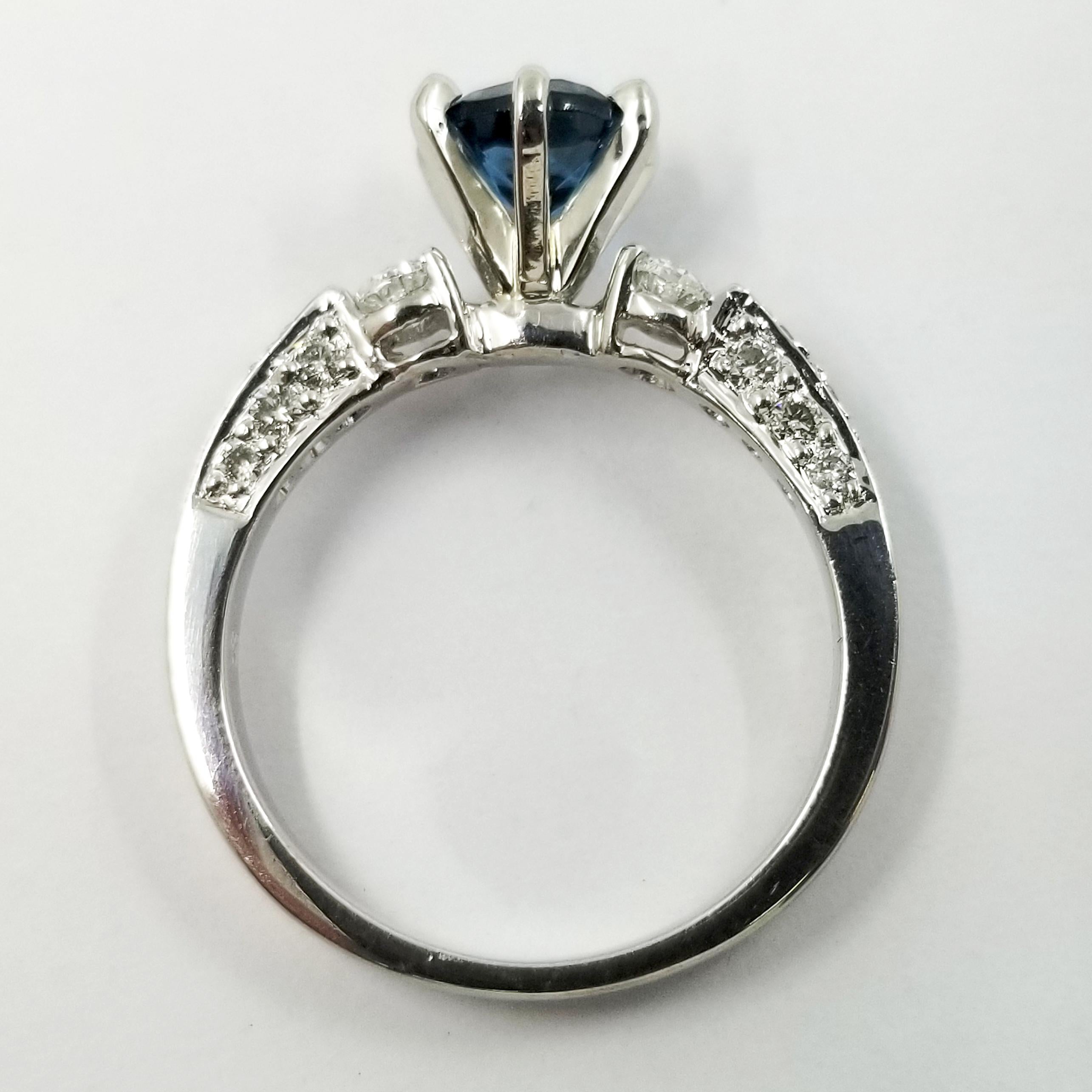 Contemporary Platinum, Blue Topaz and Diamond Ring