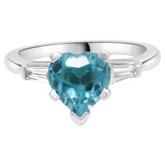 Platinum Blue Topaz Heart Ring W/ Tapered Baguette Diamonds Platinum Blue Topaz Heart Ring W/ Tapered Baguette Diamonds