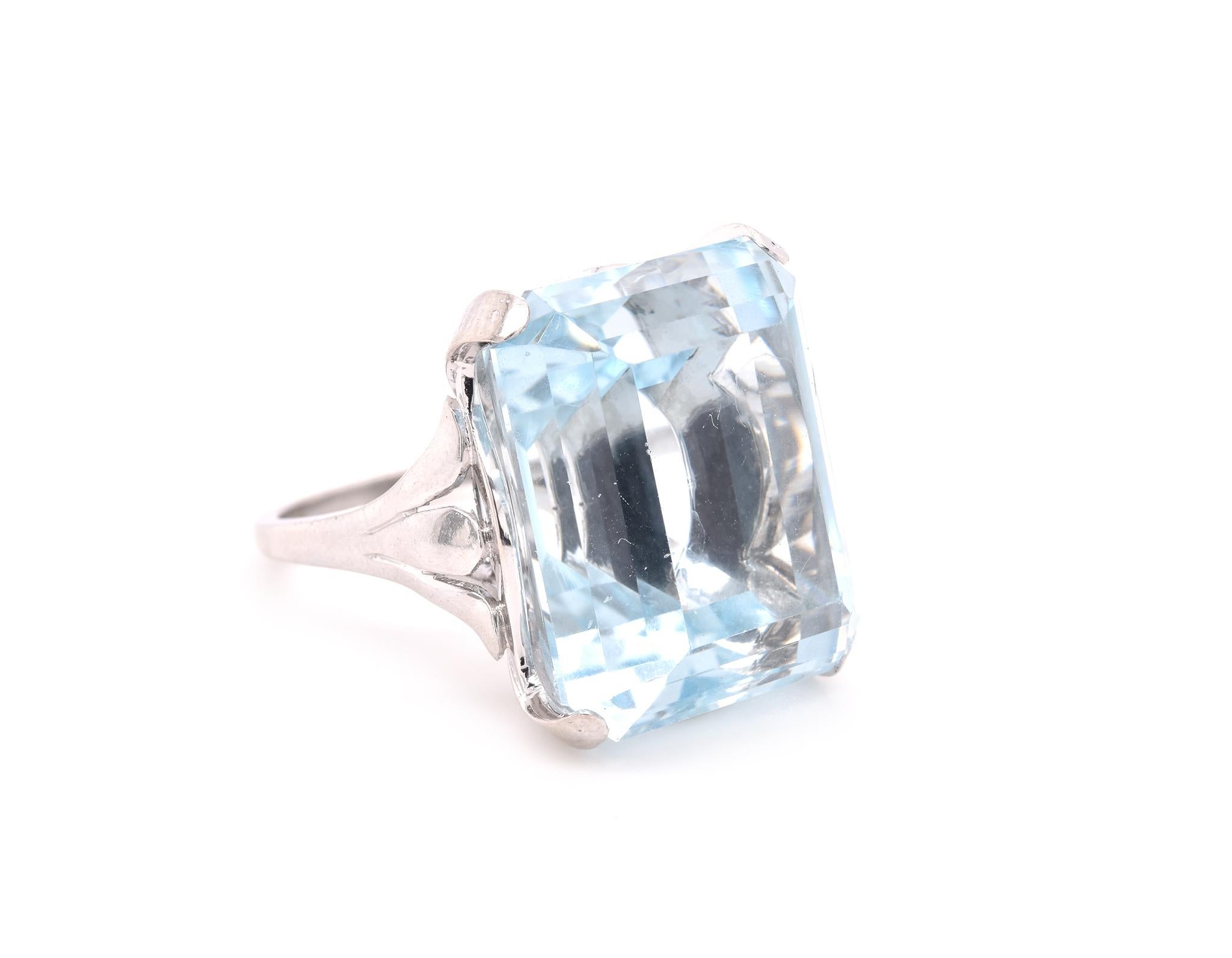 Designer: custom
Material: platinum
Blue Topaz: 1 emerald cut = 35.40ct
Ring Size: 6.5 (please allow up to 2 additional business days for sizing requests)
Dimensions: ring top measures 19.5mm X 16mm
Weight:  17.79 grams	