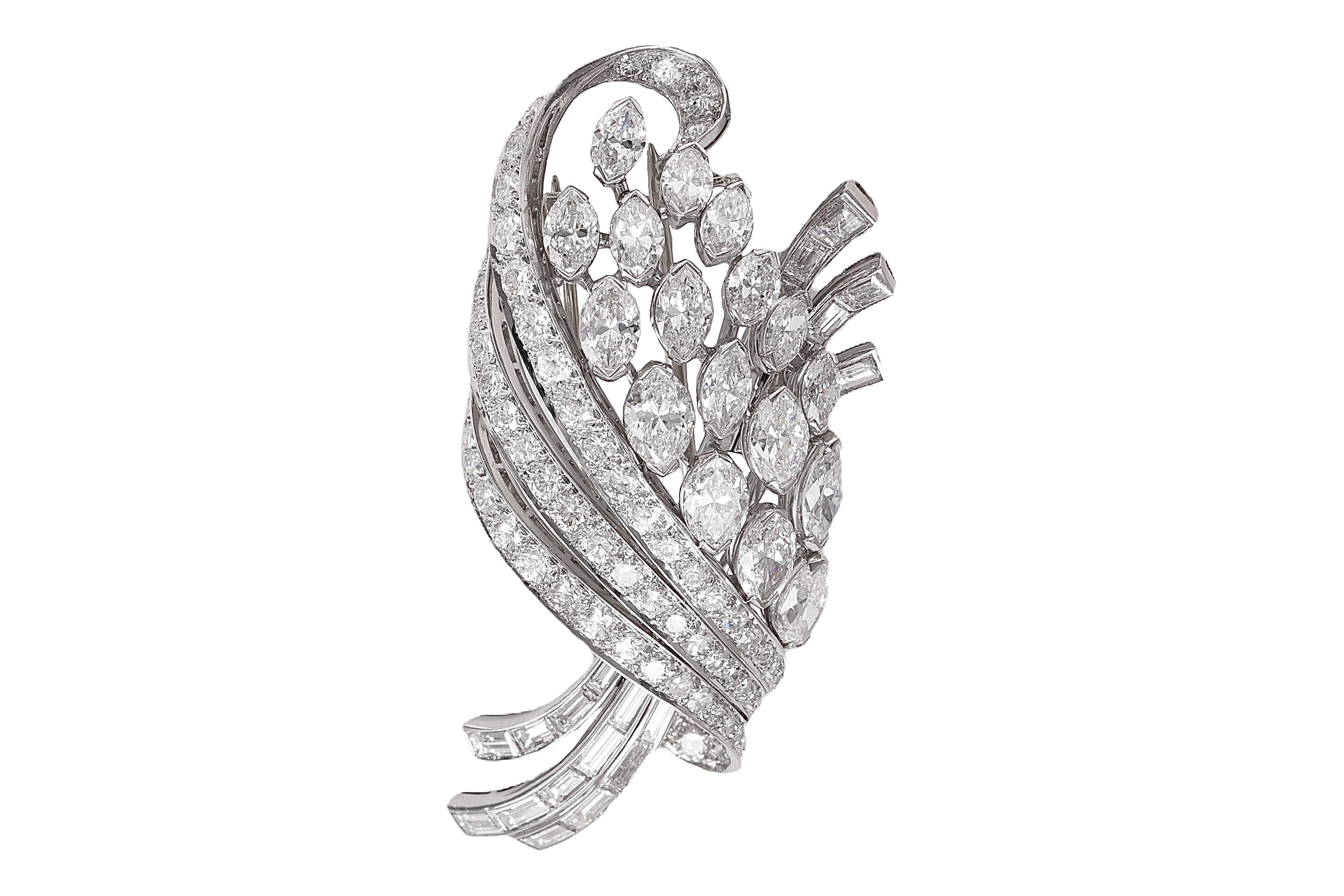 
Description : Platinum Brooch Depicting Bouquet Flowers with approx. 11.7 ct. Diamonds from Estate Sultan of Oman Qaboos Bin Said

Completely hand made and set with the most beautiful diamonds !

Diamonds
Marquise Cut : approx. 5.2 ct.
Baguette Cut