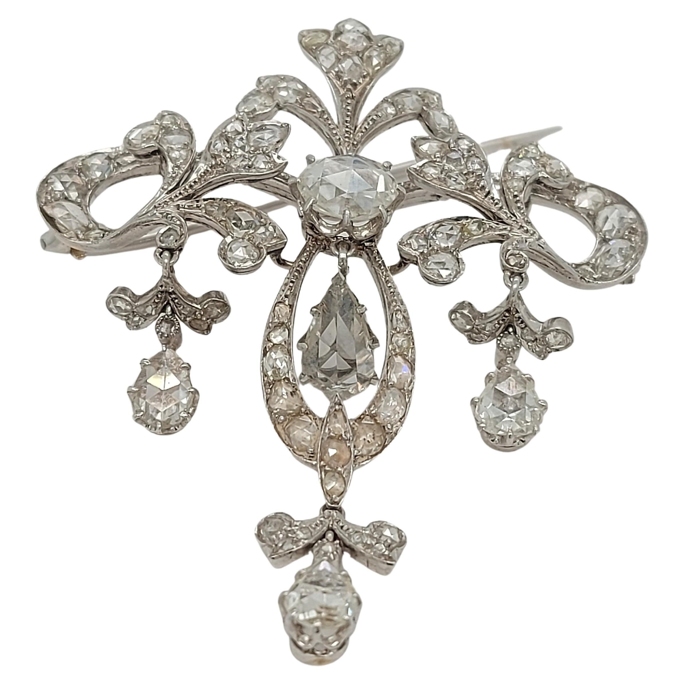 Magnificent Vintage Platinum  Brooch / Necklace  with Rose Cut Diamonds
Pin can be removed and possibility to put chain and wear it as necklace or pendant.

Diamonds: Rose cut diamonds

Material: 18kt White gold

Measurements: 47.5mm x 56.5mm x