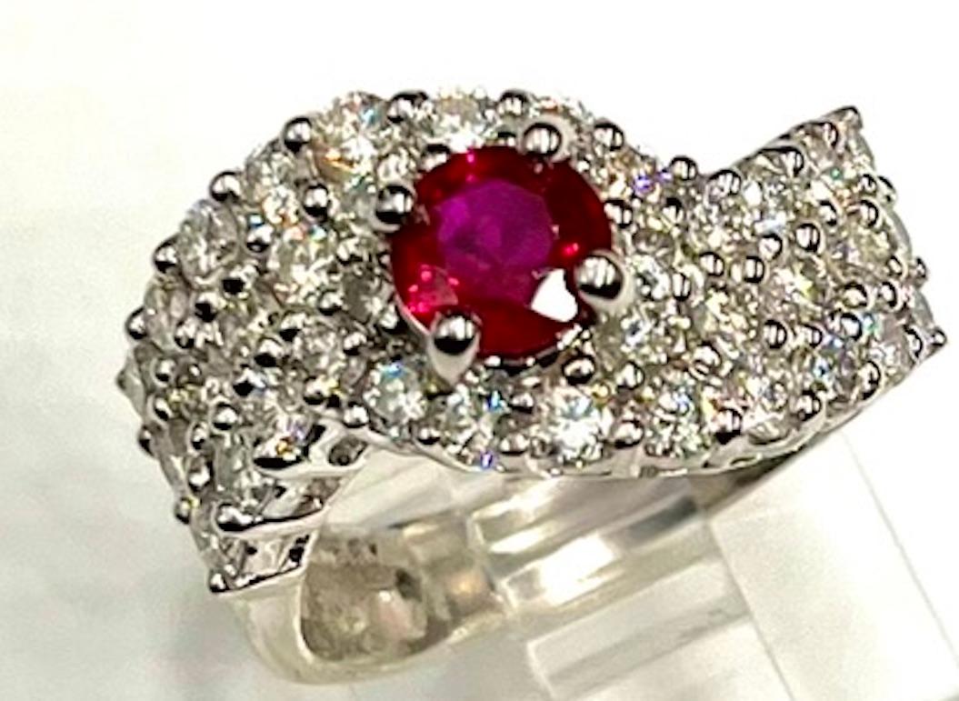 Oval Cut Platinum Burmese Ruby and Diamond Ring For Sale
