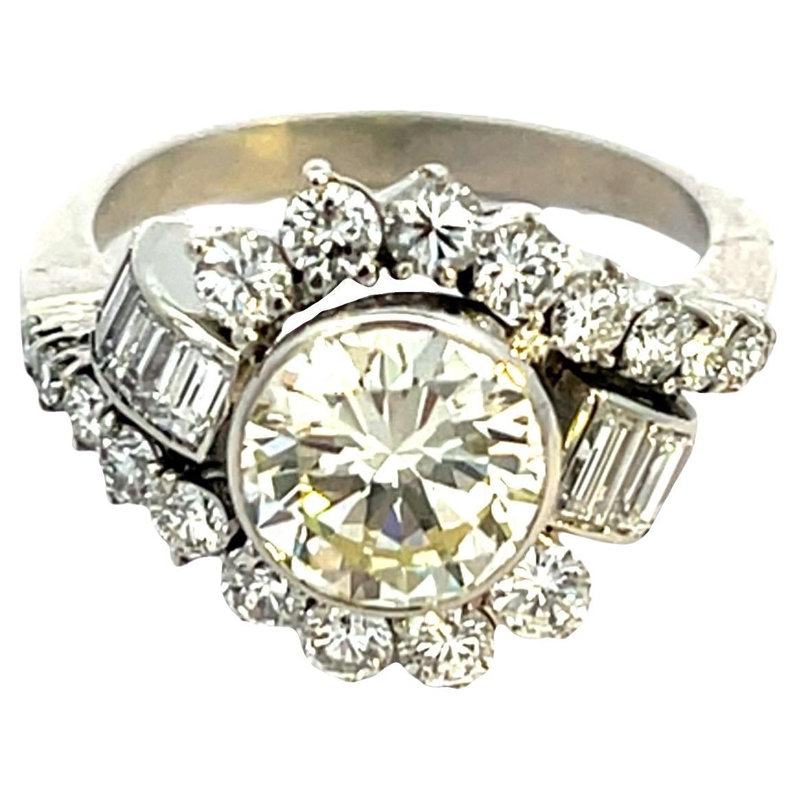 Platinum Bypass Ring with 1.75ct Brilliant-Cut Diamond and Baguettes For Sale