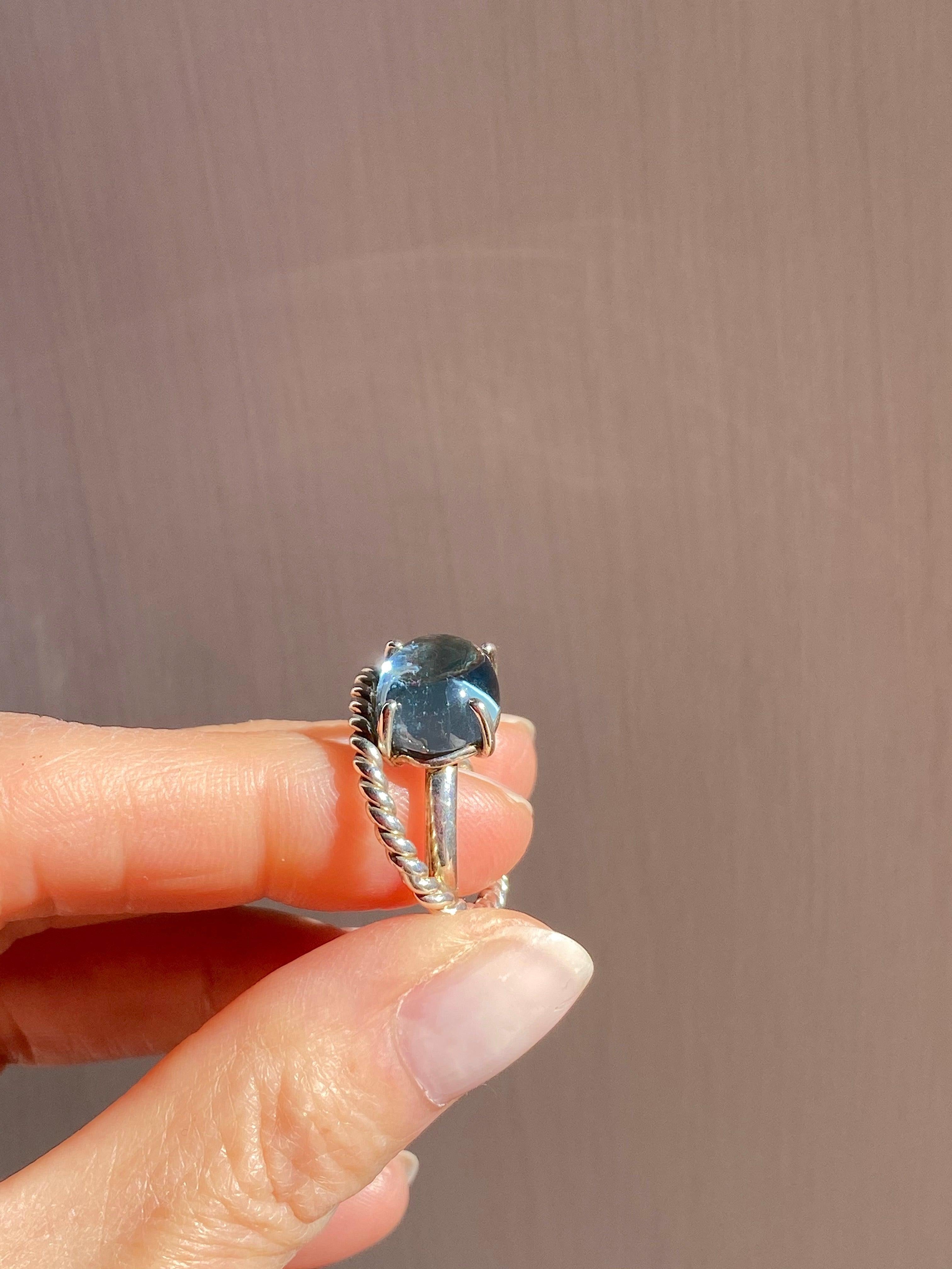 Platinum Cabochon Cut Blue Topaz Modern Design Ring
Here there is an amazing cocktail ring handcrafted in platinum and adorned with a deep blue cabochon cut topaz.
Every size available in two weeks by order.
A ring made of three crossed gold threads