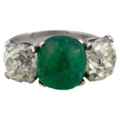 Platinum Cabochon Emerald and Old Mine Cut Diamond Three-Stone Ring