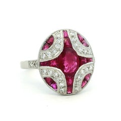 Platinum Cabochon Ruby, Diamond and Calibré Ruby Bombé Ring