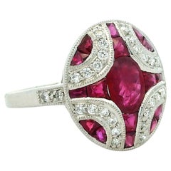 Platinum Cabochon Ruby, Diamond and Calibré Ruby Bombé Ring