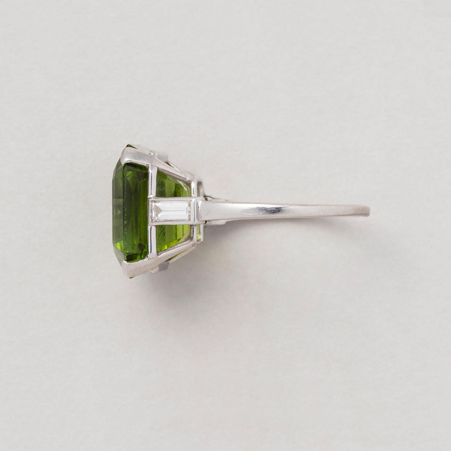 Emerald Cut Platinum Cartier Ring with Peridot and Diamond For Sale