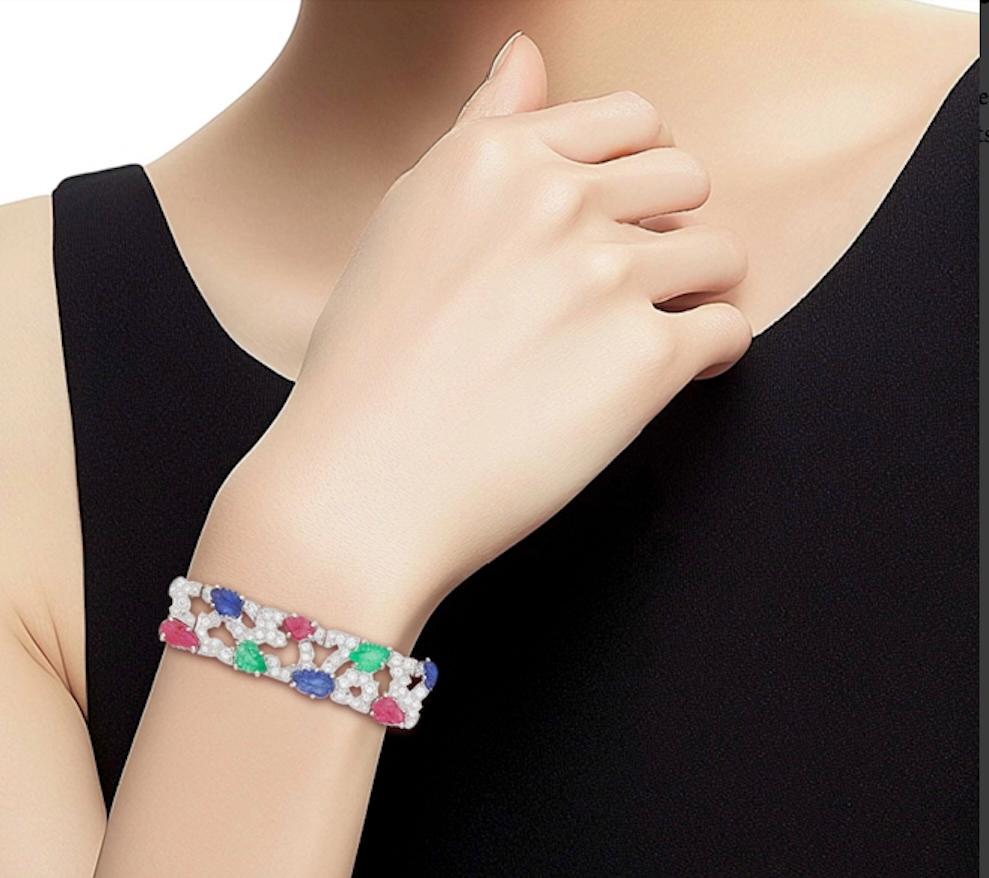 Round Cut Platinum, Carved Ruby Sapphire  Emerald  and Diamond Bracelet For Sale