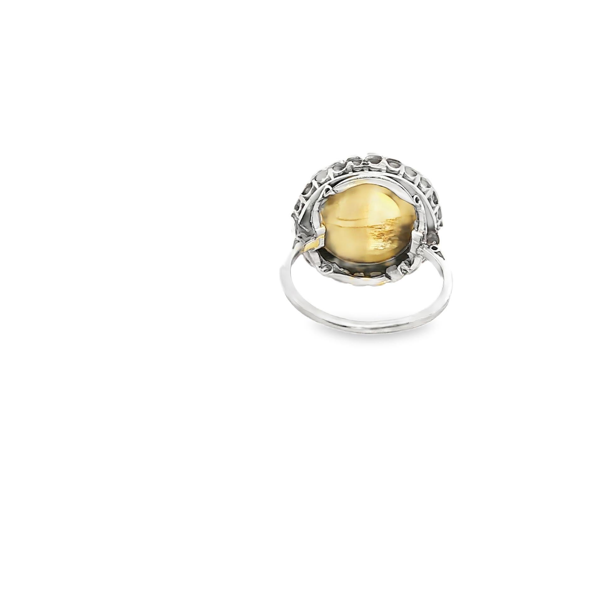 Anello di platino con occhio di gatto e diamante, CIRCA 1920 in vendita 1