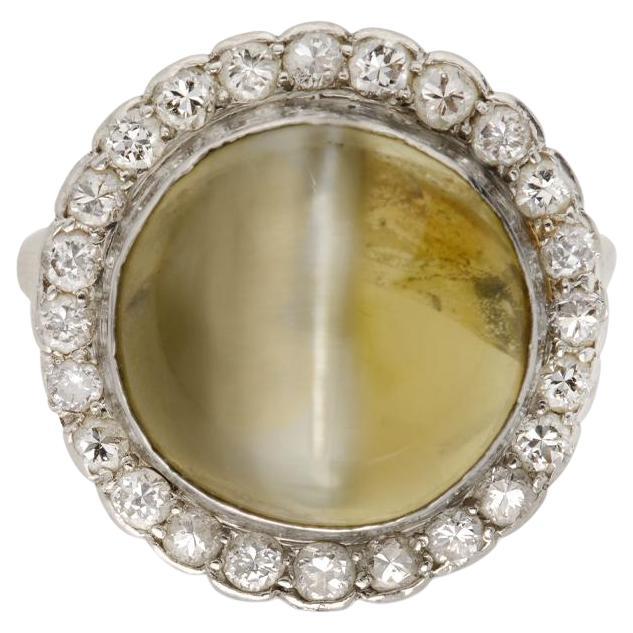 Bague œil de chat et diamant en platine, vers 1920