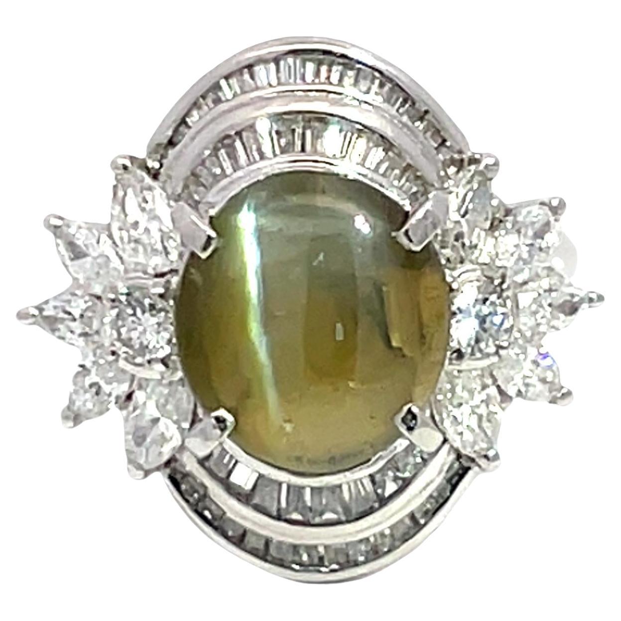 Bague en platine avec œil de chat et diamant