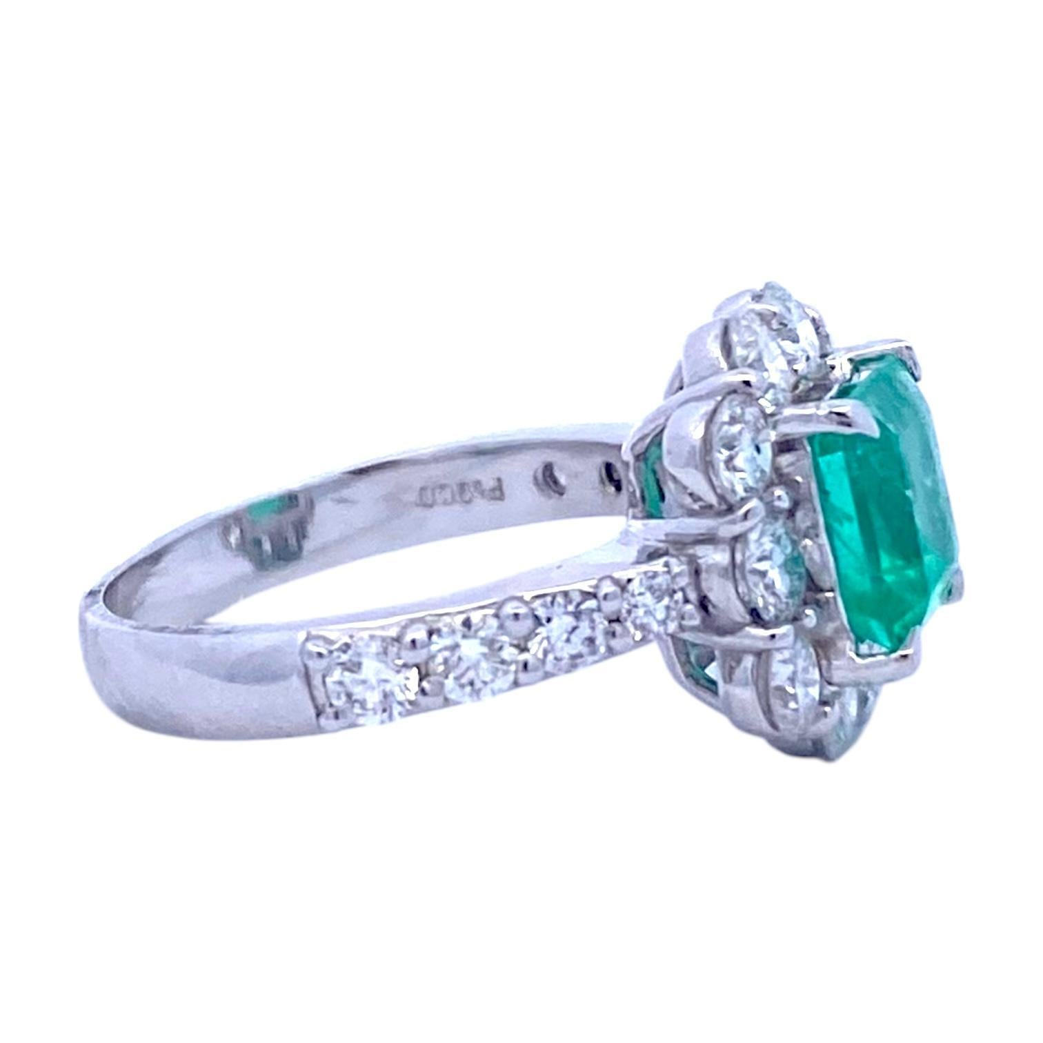 Crafted in platinum, the ring features an emerald solitaire in the center set in a sparkling diamond bezel, supported by diamond set shoulders and a 3 mm wide band.
Emerald: 1.51 ct. (Stamped inside the band). Laboratory certificate