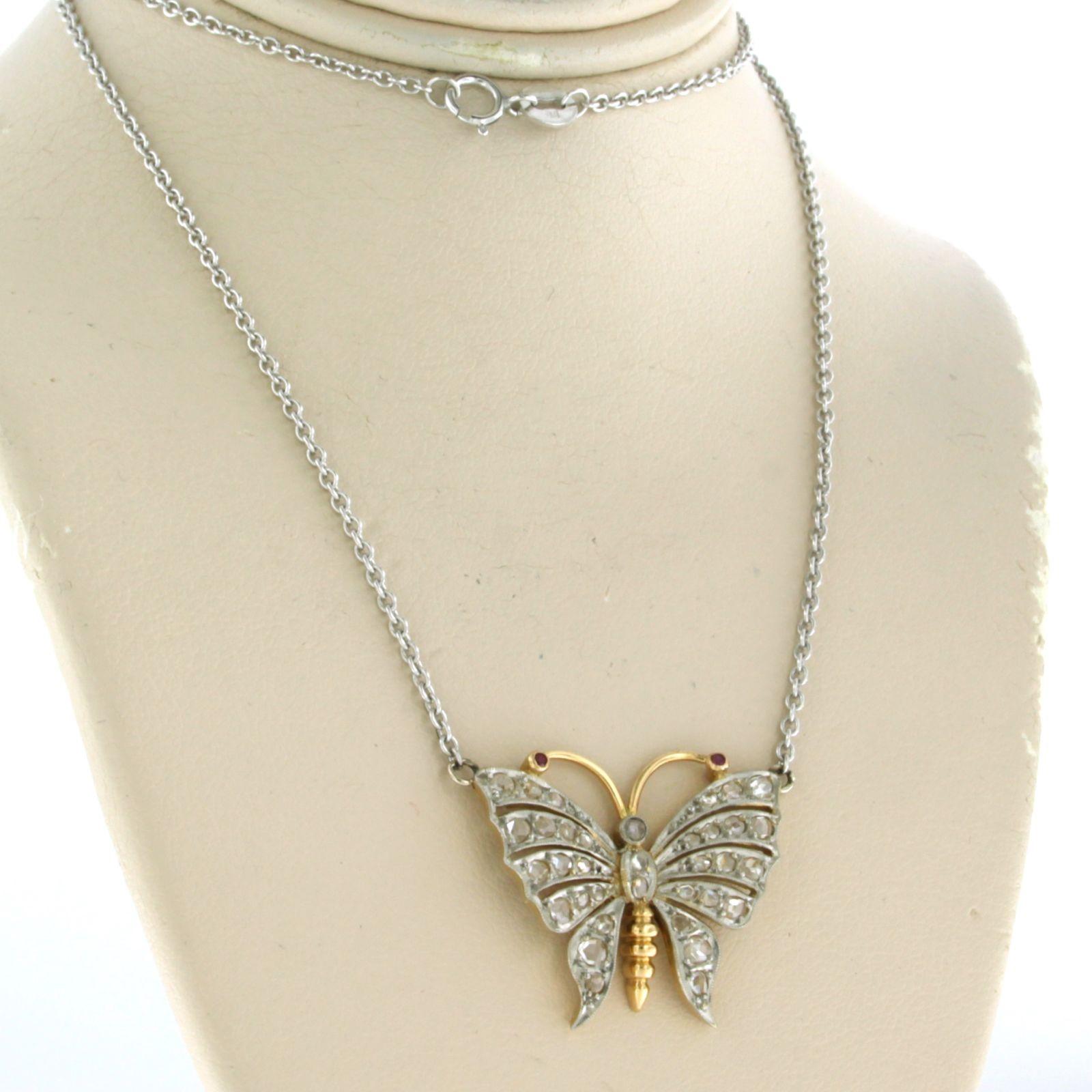 Art Nouveau Platinum chain and a gold and platinum butterfly pendant with diamonds and ruby