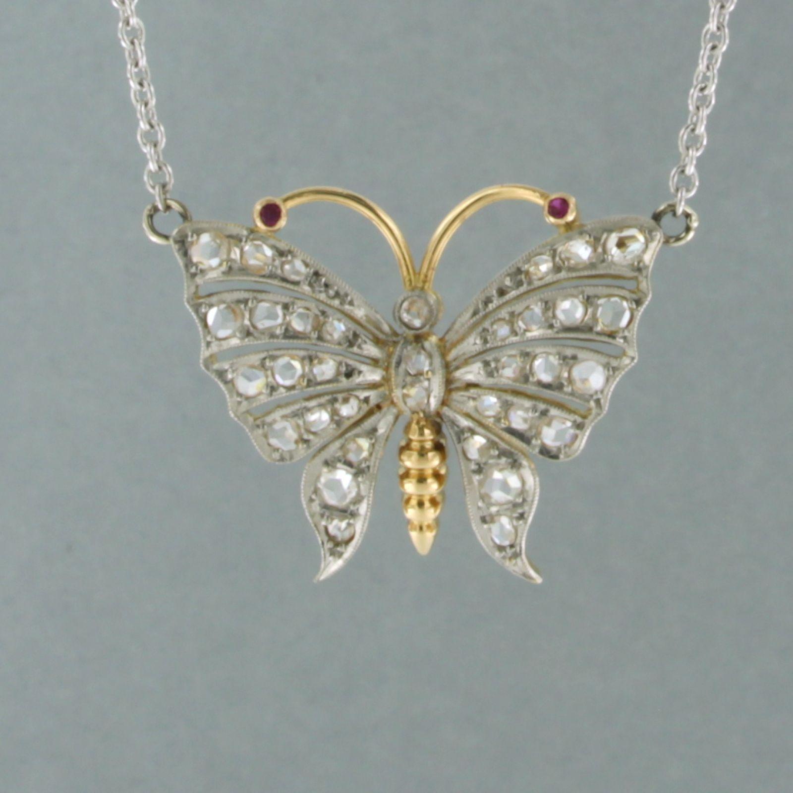 Rose Cut Platinum chain and a gold and platinum butterfly pendant with diamonds and ruby