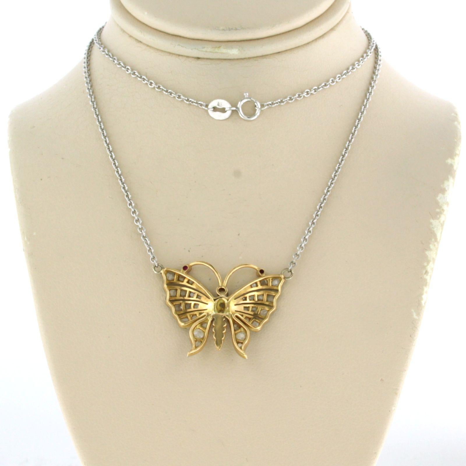 Platinum chain and a gold and platinum butterfly pendant with diamonds and ruby 1