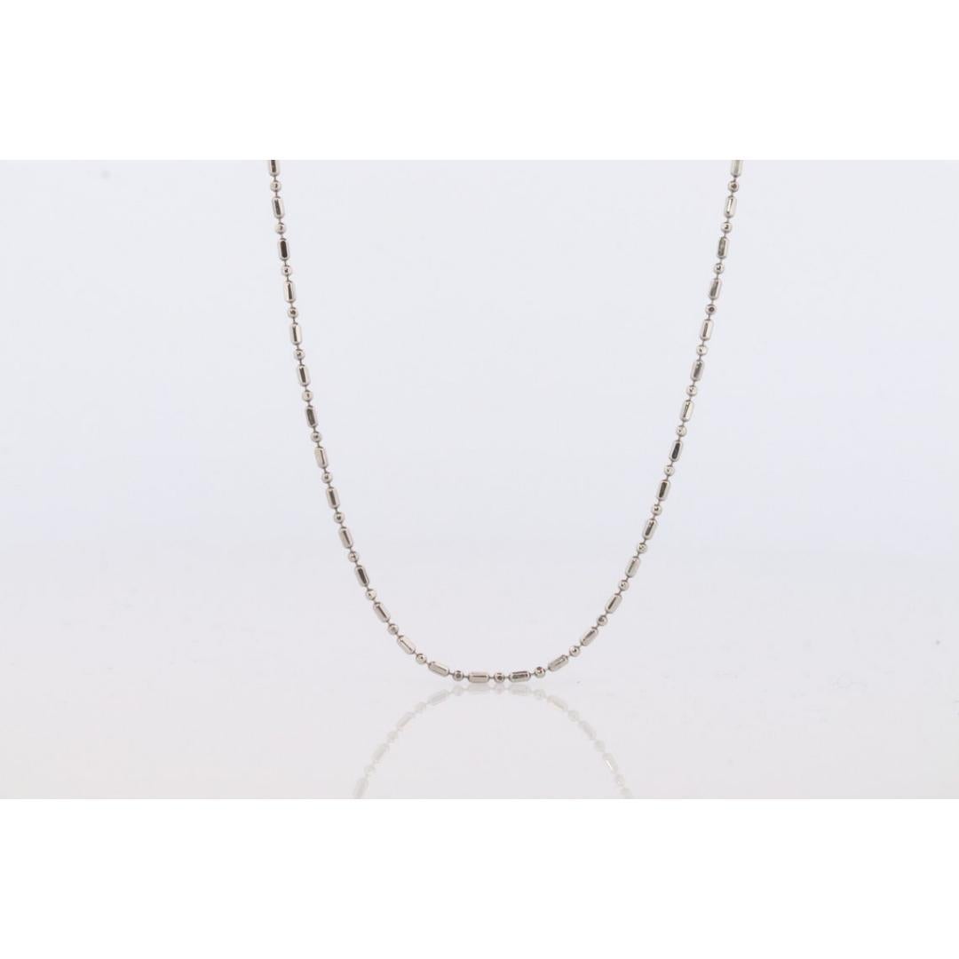 Vintage degli anni '90
Materiali: Platino

Stile: Minimalista

Lunghezza della collana: 15,5 pollici

Un'aggiunta straordinaria alla tua collezione. Molto raro

Platino PT850

Catena a barre con perline

Dettagli:
2,2 grammi
Larghezza 1 mm.
