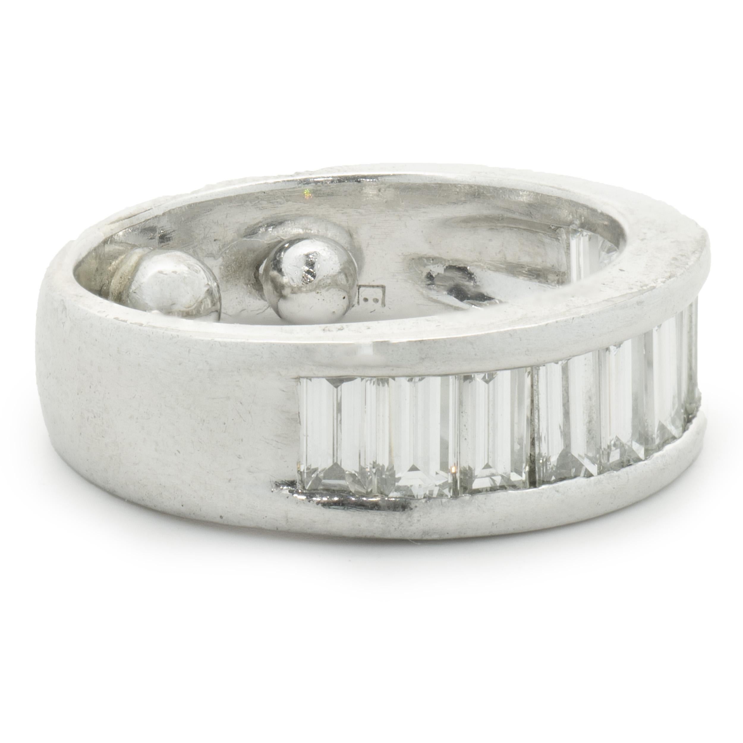 Designer: Custom
Material: Platinum
Diamonds: 11 baguette cut = 1.32cttw
Color: H
Clarity: SI1
Size: 4 sizing available 
Dimensions: ring measures 7mm in width
Weight: 11.63 grams