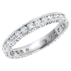 hand of eternity Platinum Channel Set Diamond Eternity Band with Old Master Hand Engraving
