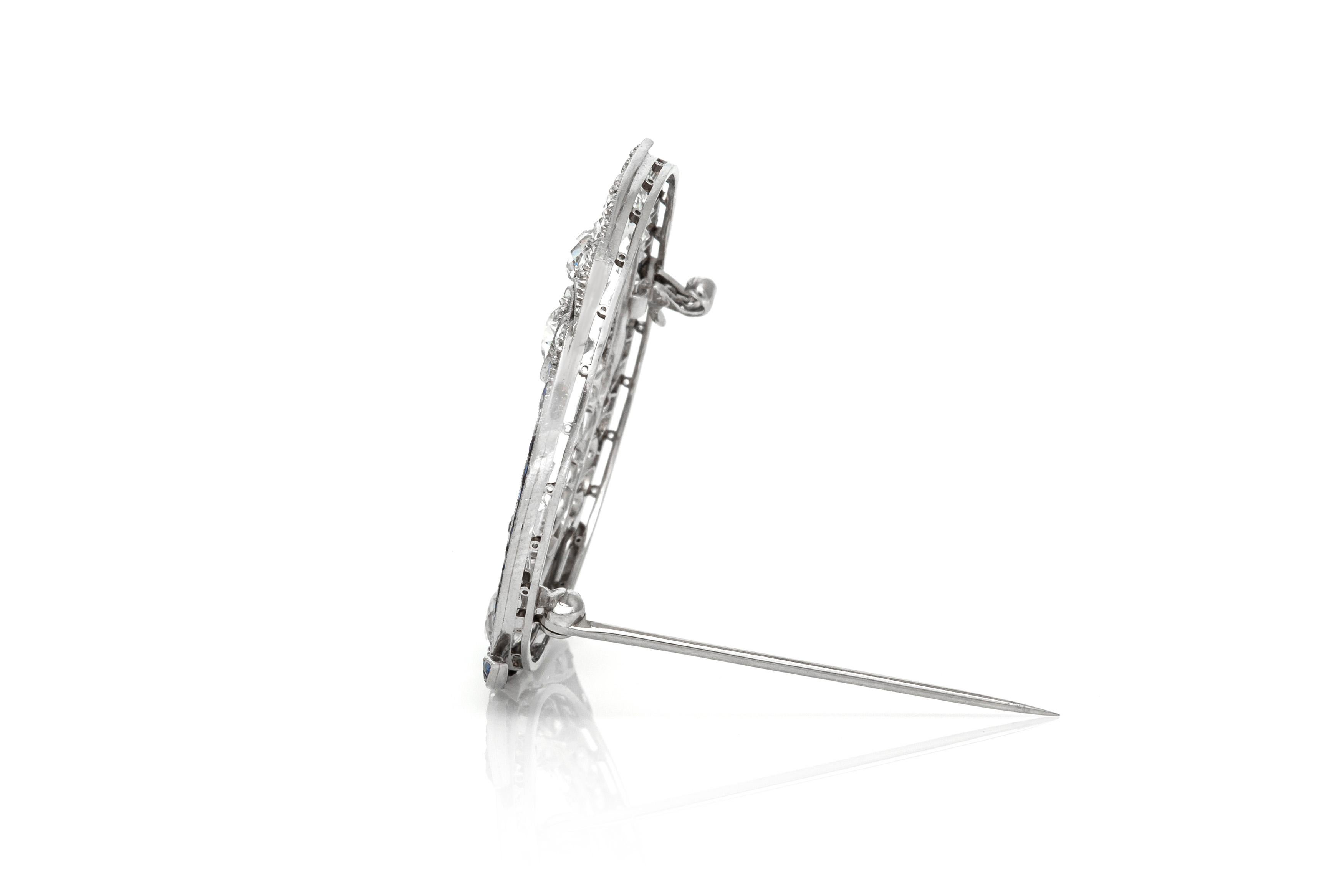 The brooch is finely crafted in platinum with diamonds weighing approximaately total of  6.00 carat and sapphire weighing approximately total of 1.00 carat.
