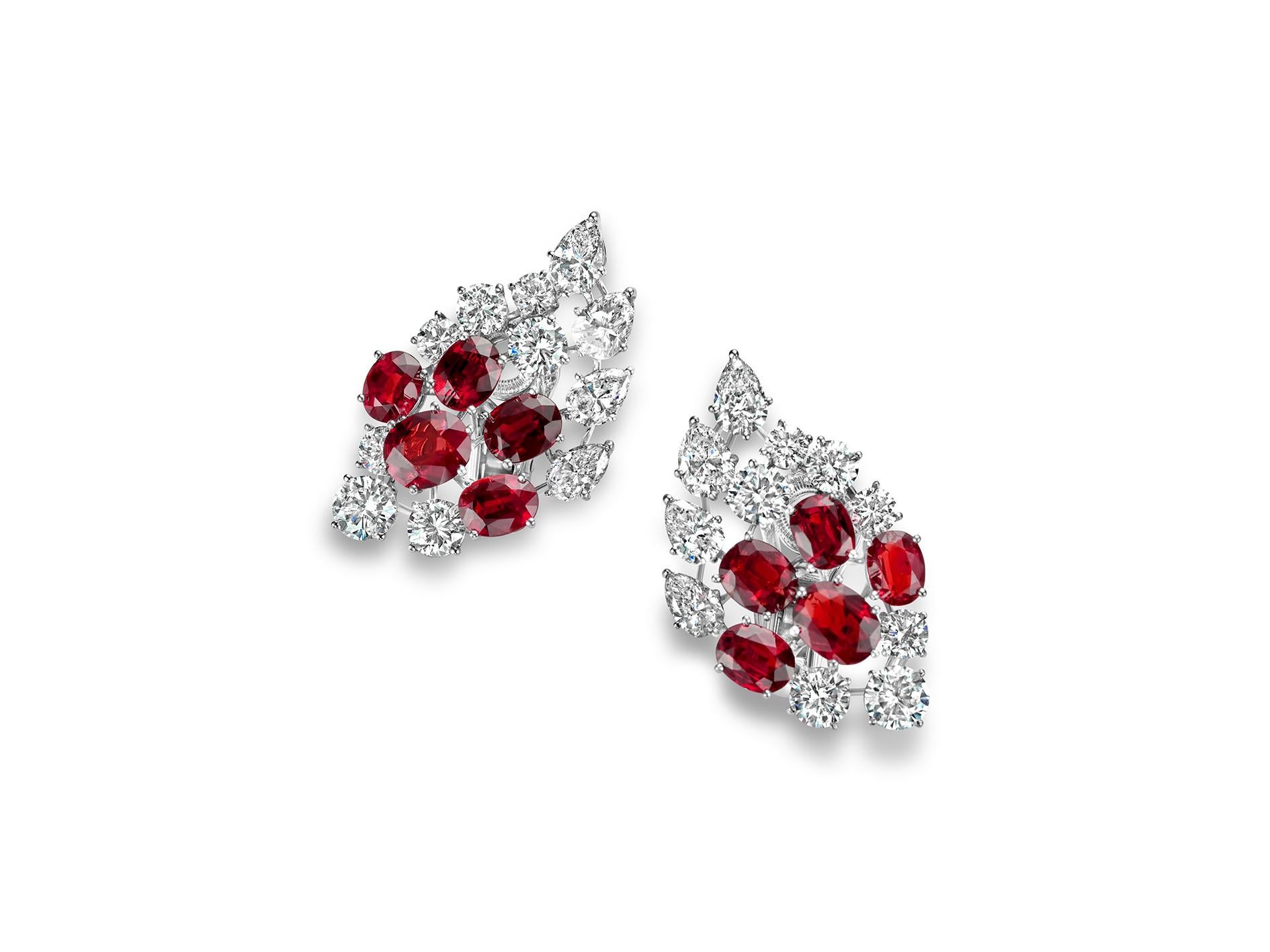 Magnificent Platinum Clip - On Earrings with 7ct Rubies CGL Certified, 6.8ct Diamonds , Estate His Majesty The Sultan Of Oman Qaboos Bin Said

Ruby: 10 Oval shaped, Intense red, Siam Rubies together 7 ct.
Comes with Carat Gem Lab certificate