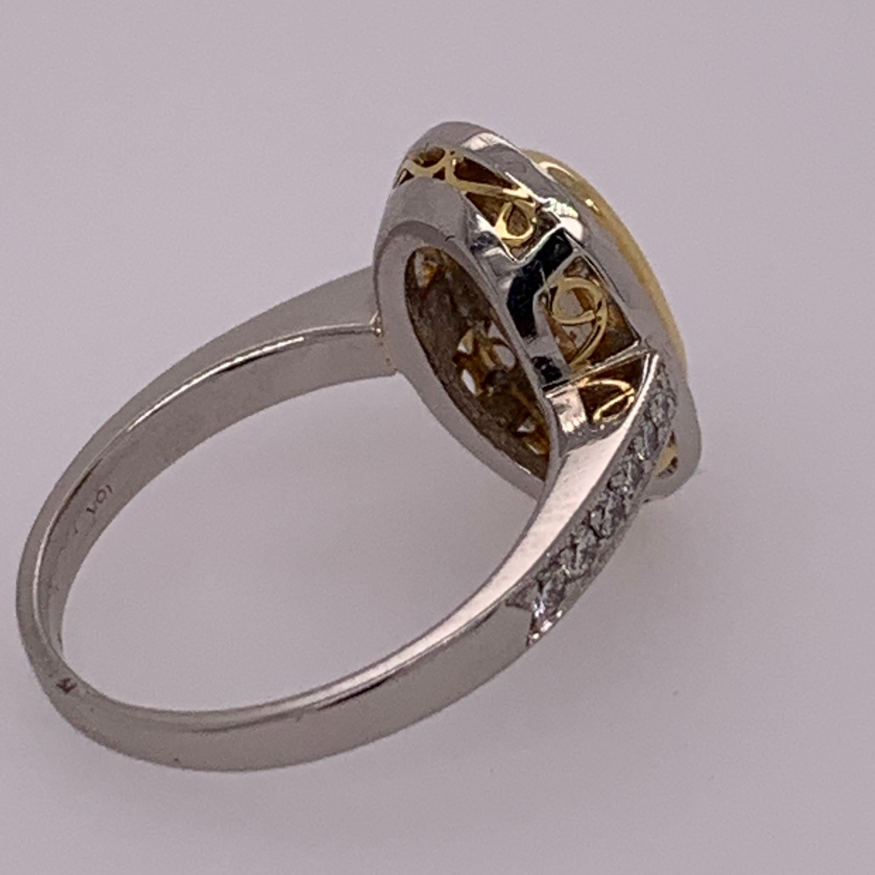 Modern EGL Certified 2 Carat Natural Oval U-V Light Yellow VS2 Diamond Engagement Ring For Sale