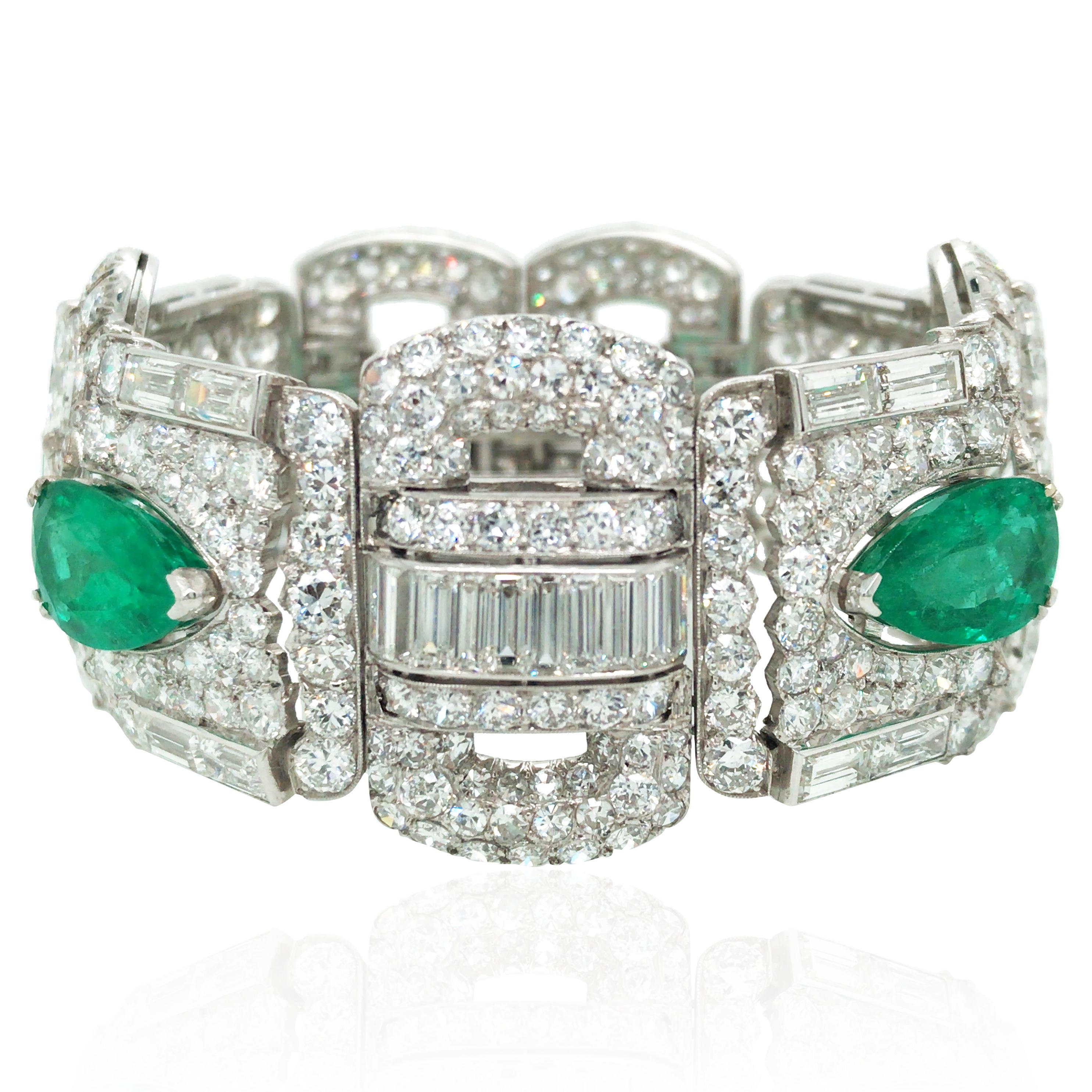 This stunning Art Deco bracelet of sophisticated aesthetic is crafted platinum and set with emerald and diamond. There are 414 round-cut diamonds, 8 oval-cut diamonds, 38 baguette diamons. The four pear emeralds are approx. 4.1ct, 4.7ct, 6.5ct and