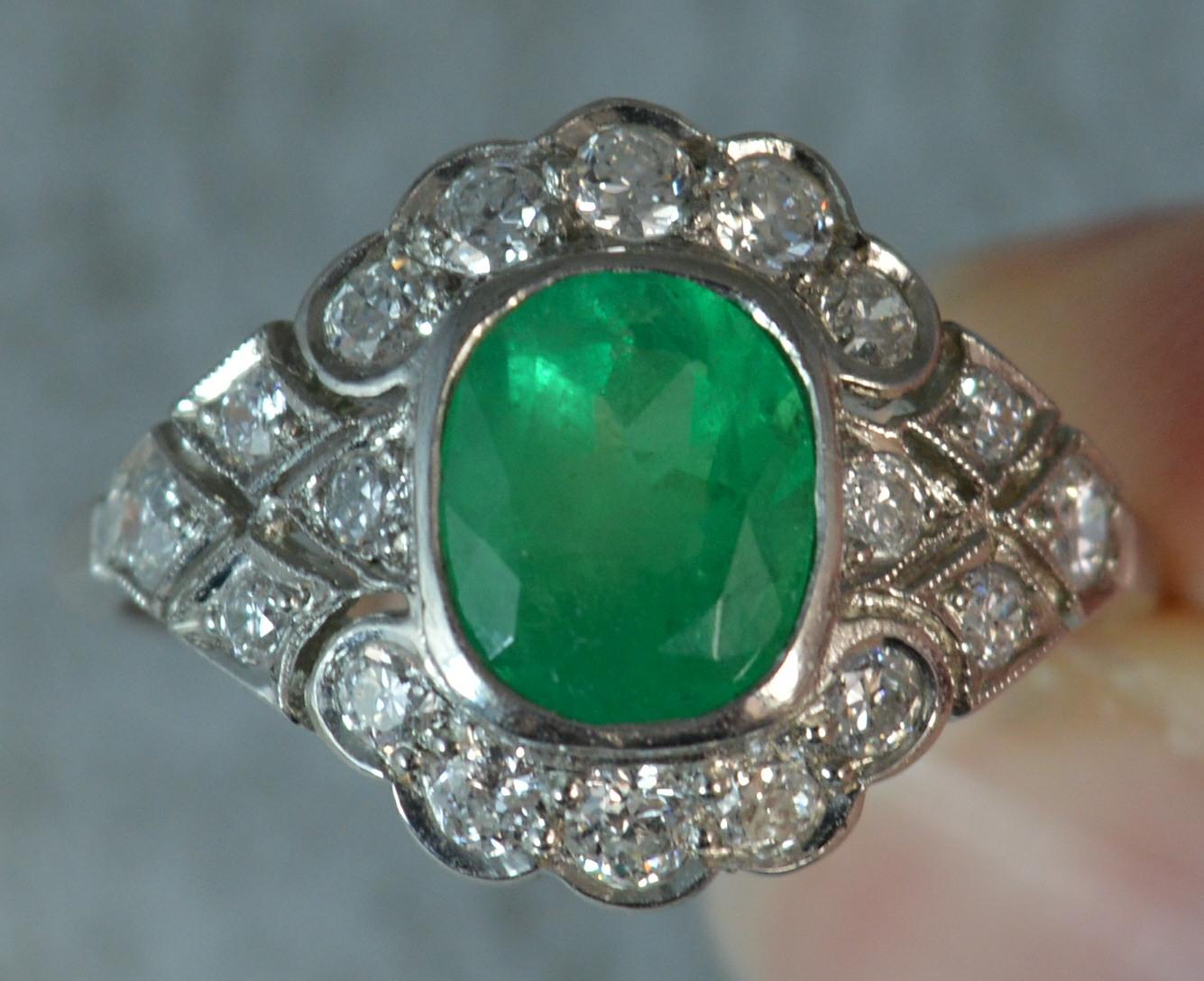 Platinum Colombian Emerald and Diamond Cluster Ring In Excellent Condition In St Helens, GB