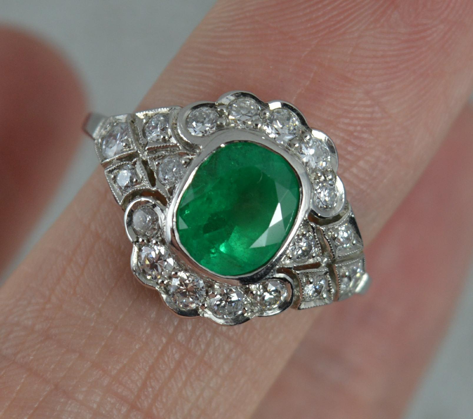 Platinum Colombian Emerald and Diamond Cluster Ring In Excellent Condition In St Helens, GB