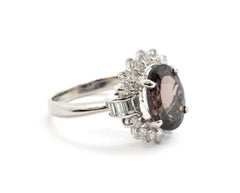 Platinum Color Changing 3.92 Carat Garnet and 0.78 Carat Diamond Halo Ring