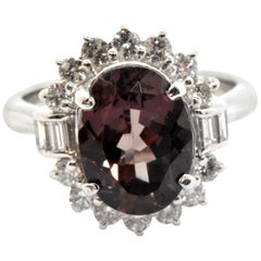 Platinum Color Changing 3.92 Carat Garnet and 0.78 Carat Diamond Halo Ring