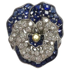 Platinum, Colored Diamond, Diamond, and Sapphire Brooch