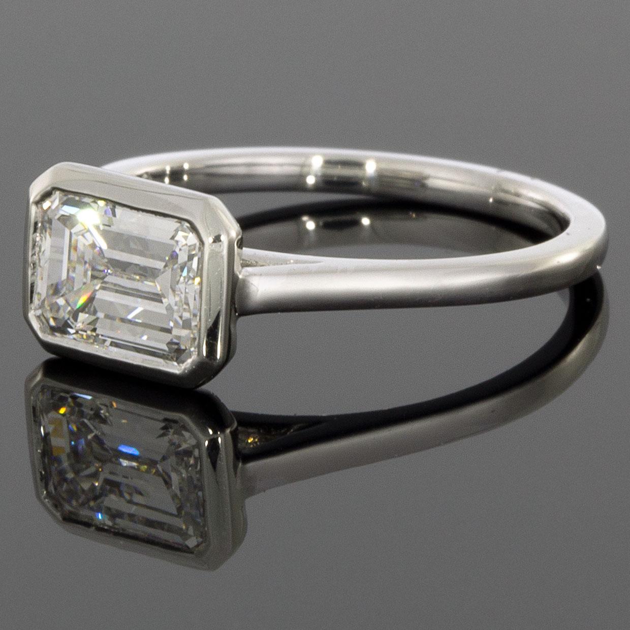 Platinum Colorless 1.56 Carat Emerald Cut Diamond Solitaire Engagement Ring In Excellent Condition In Columbia, MO