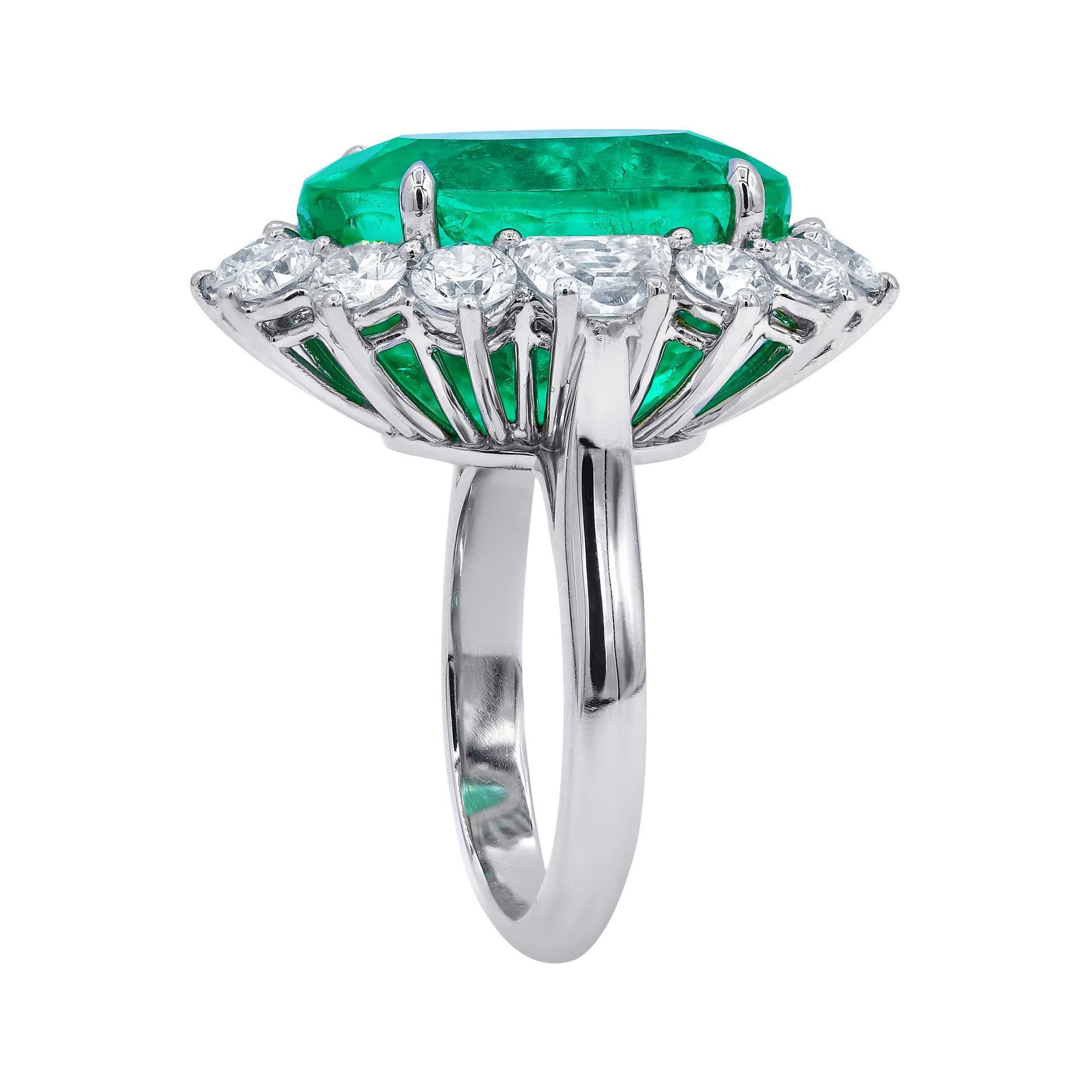 Platinum emerald and diamond flower ring featuring a 15.72 ct Columbian green emerald (GIA certified) set with round diamonds totaling 3.45 cts 
