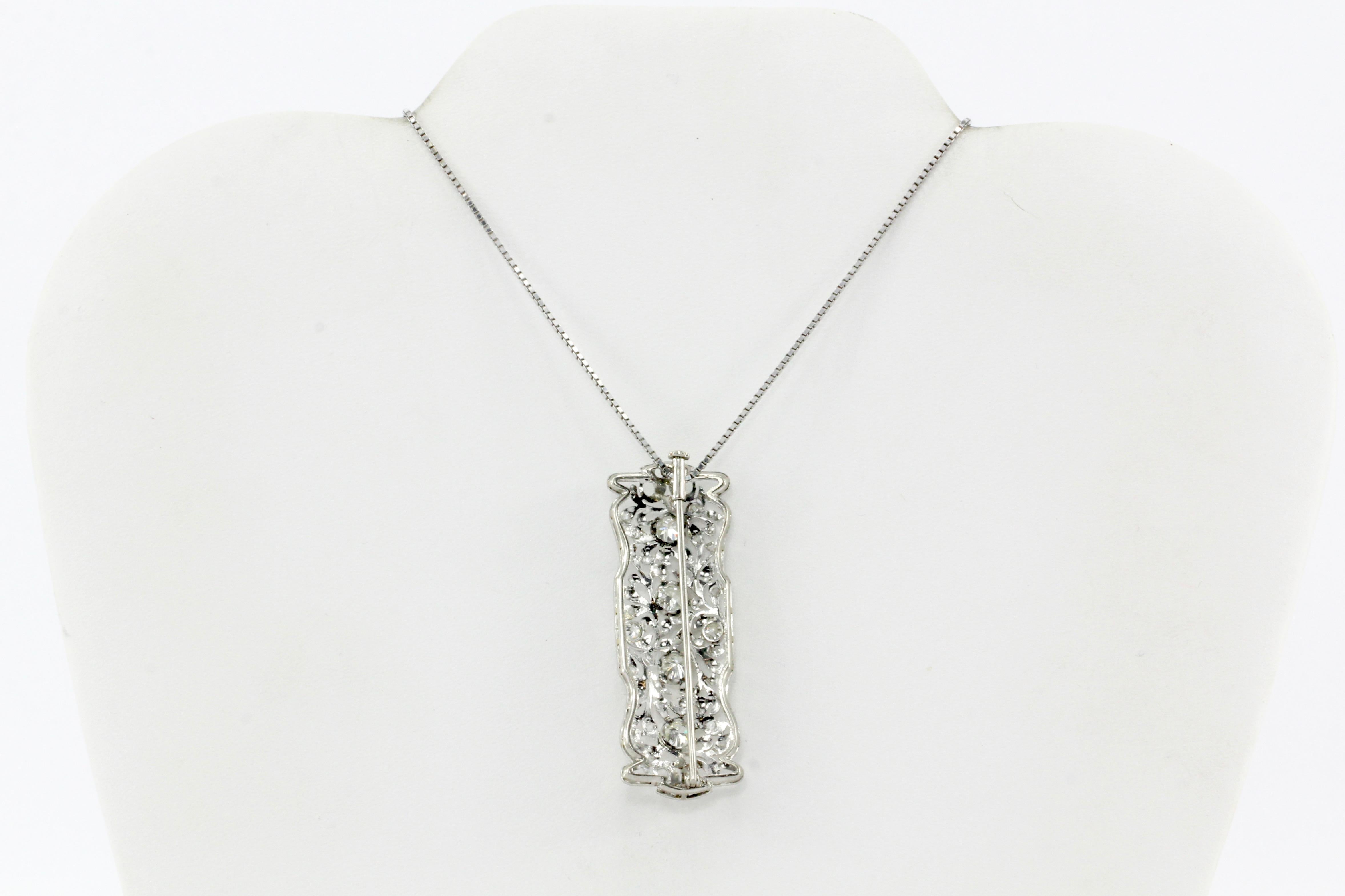 Era: Art Deco

Hallmarks: 750 (on chain)

Composition: Platinum Pendant, 18K White Gold Chain

Primary Stone: Diamond

Stone Carat: Approximately 1 Carats Total Weight

Color / Clarity: J/L - VS2-I1

Shape: Rounds

Accent Stone: Diamond

Total