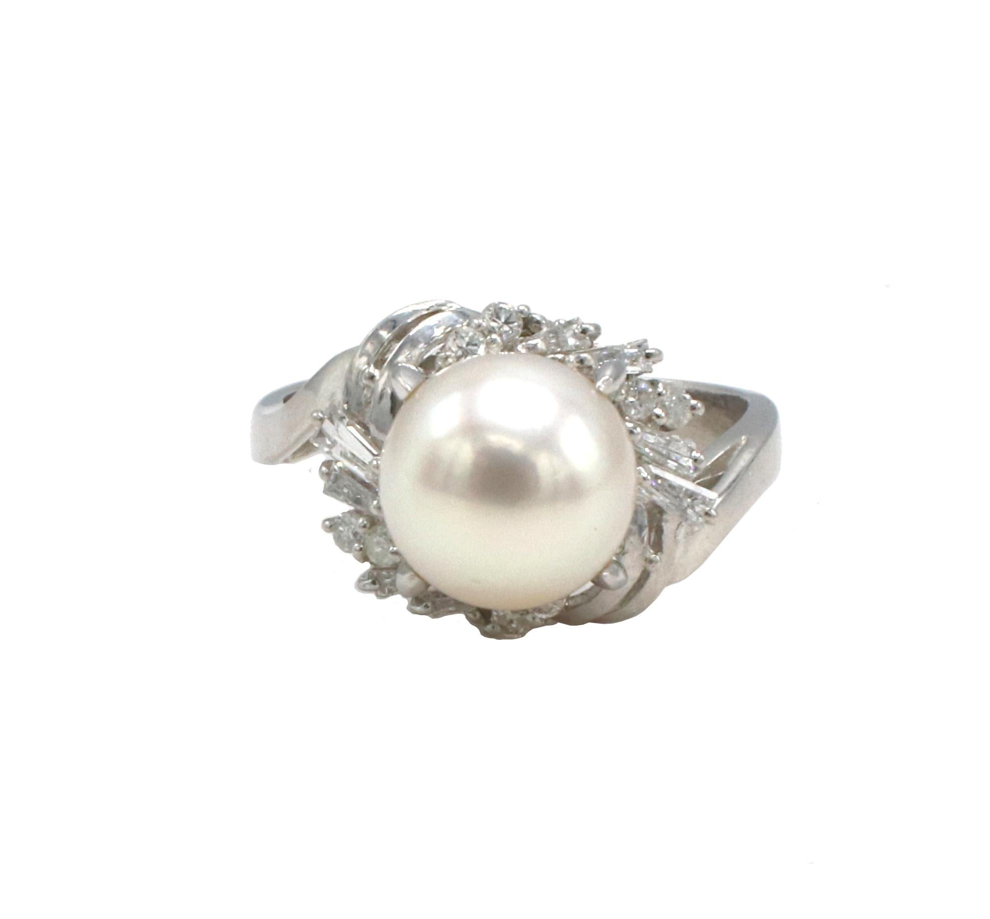 Platinum Cultured Pearl & Natural Diamond Cocktail Ring 
Metal: Platinum
Weight: 6.82 grams
Diamonds: Approx. .30 CTW G VS round and baguette natural diamonds
Size: 7 (US)
Pearl: 8.5mm white cultured pearl with creamy luster
Height: 13mm
Band width:
