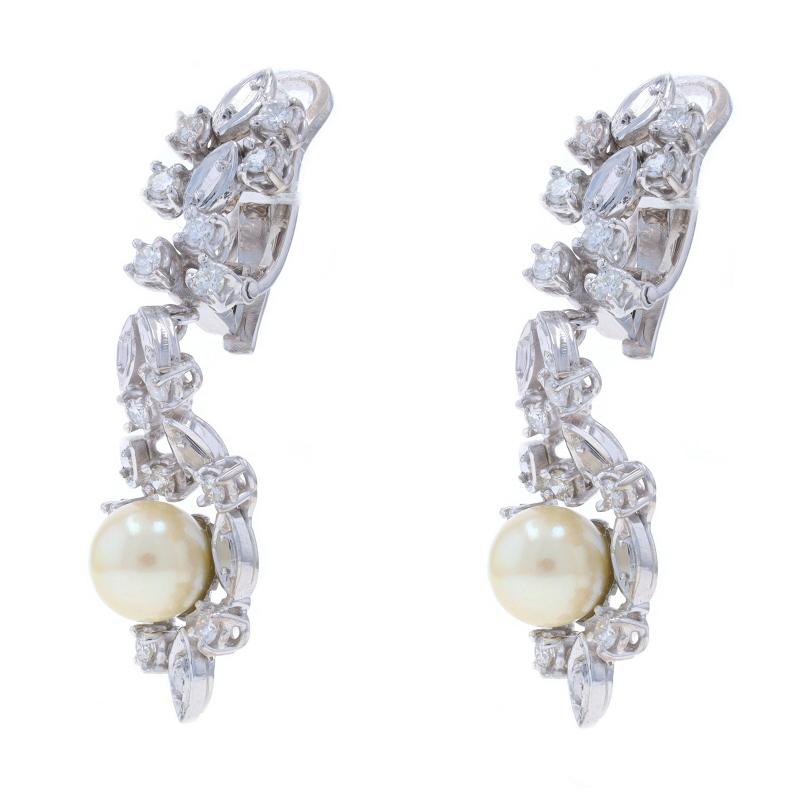 Metal Content: Platinum

Stone Information
Cultured Pearls
Color: Cream
Size: 7.5mm & 7.6mm

Natural Diamonds
Carat(s): .84ctw
Cut: Round Brilliant
Color: G - H
Clarity: SI2 - I1

Total Carats: .84ctw

Style: Dangle
Fastening Type: Clip-On