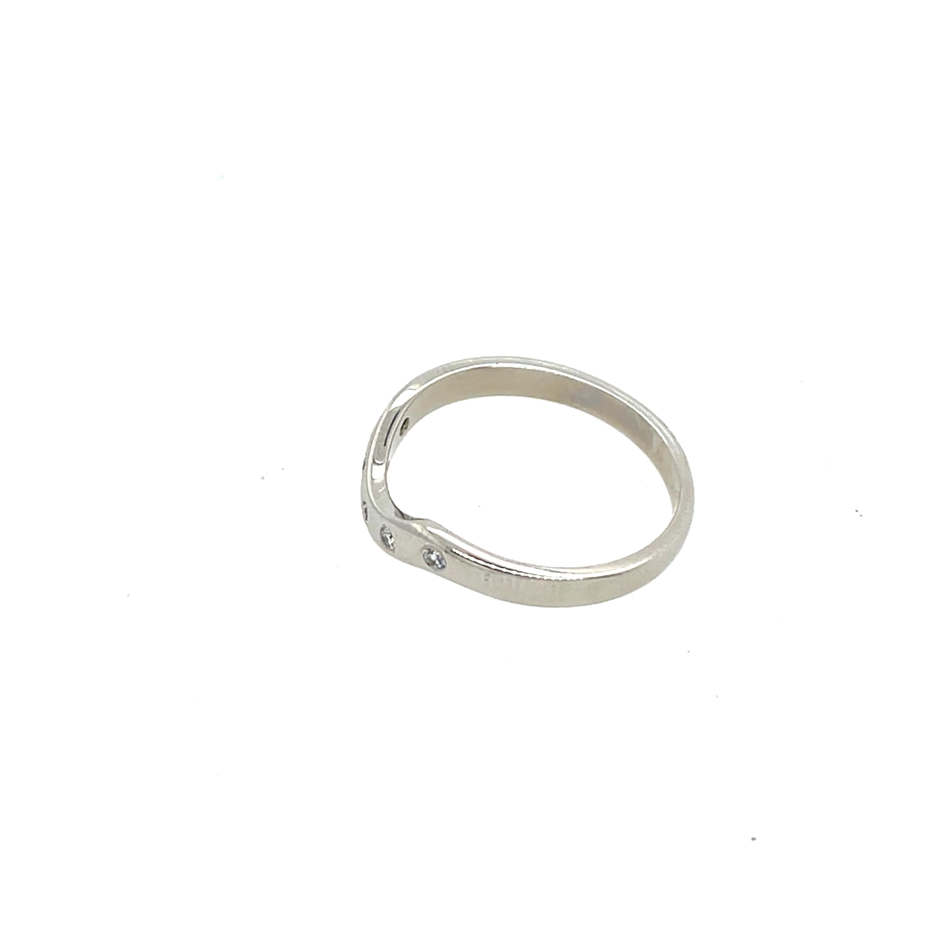 Elegant platinum wedding ring featuring a curved design, set with 5 sparkling natural diamonds. 
A timeless and sophisticated piece, perfect for complementing an engagement ring.

Total Diamond Weight: 0.075ct 
Diamond Colour: H
Diamond Clarity: