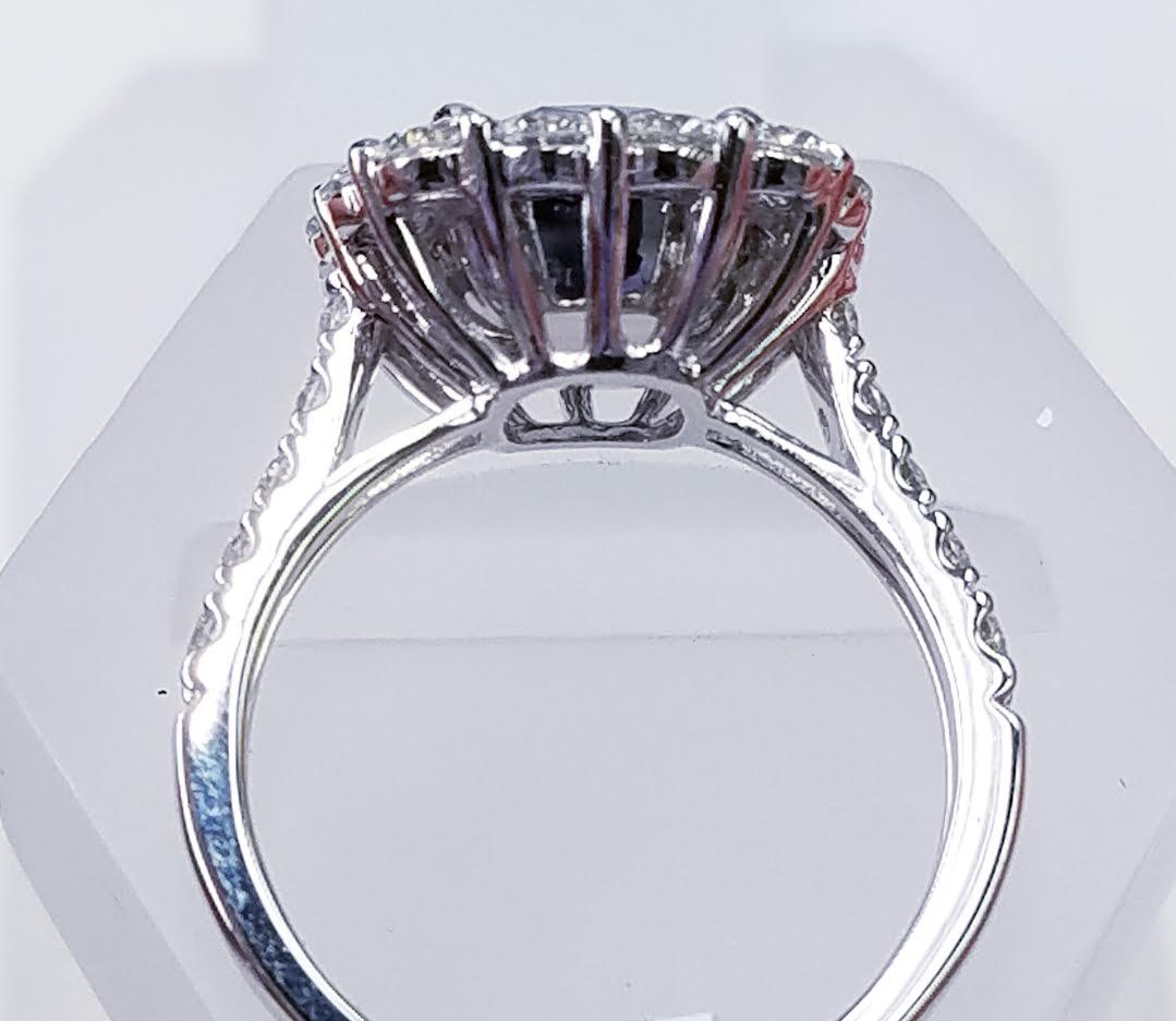 Contemporary Platinum Cushion Cut Blue Sapphire and Diamond Ring For Sale